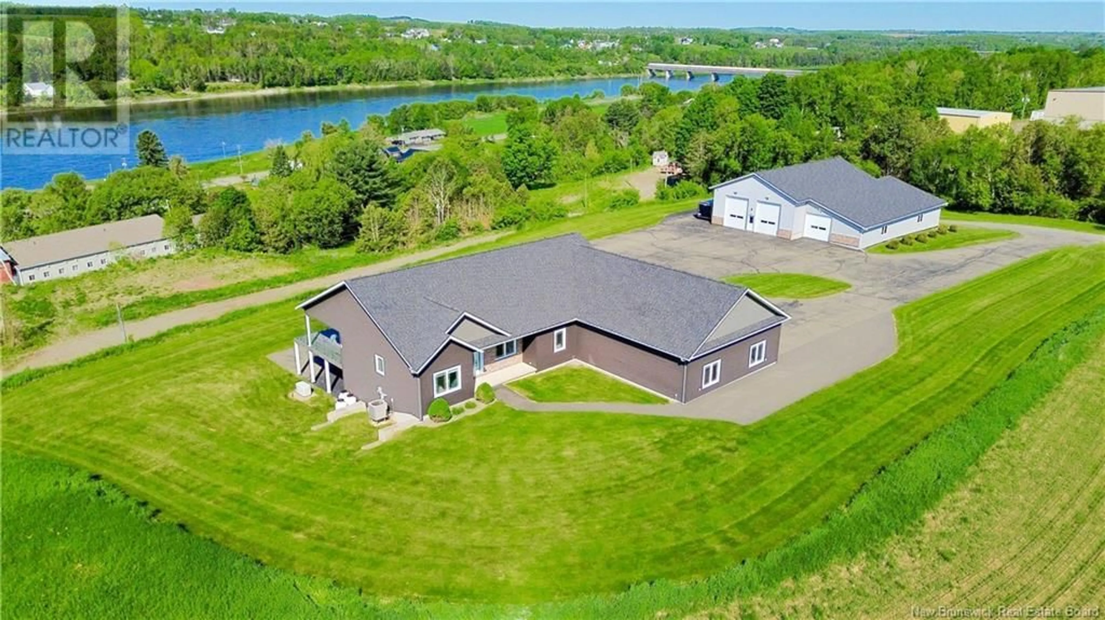 A pic from outside/outdoor area/front of a property/back of a property/a pic from drone, water/lake/river/ocean view for 52 MCMULLIN ROAD, Hartland New Brunswick E7P2R7