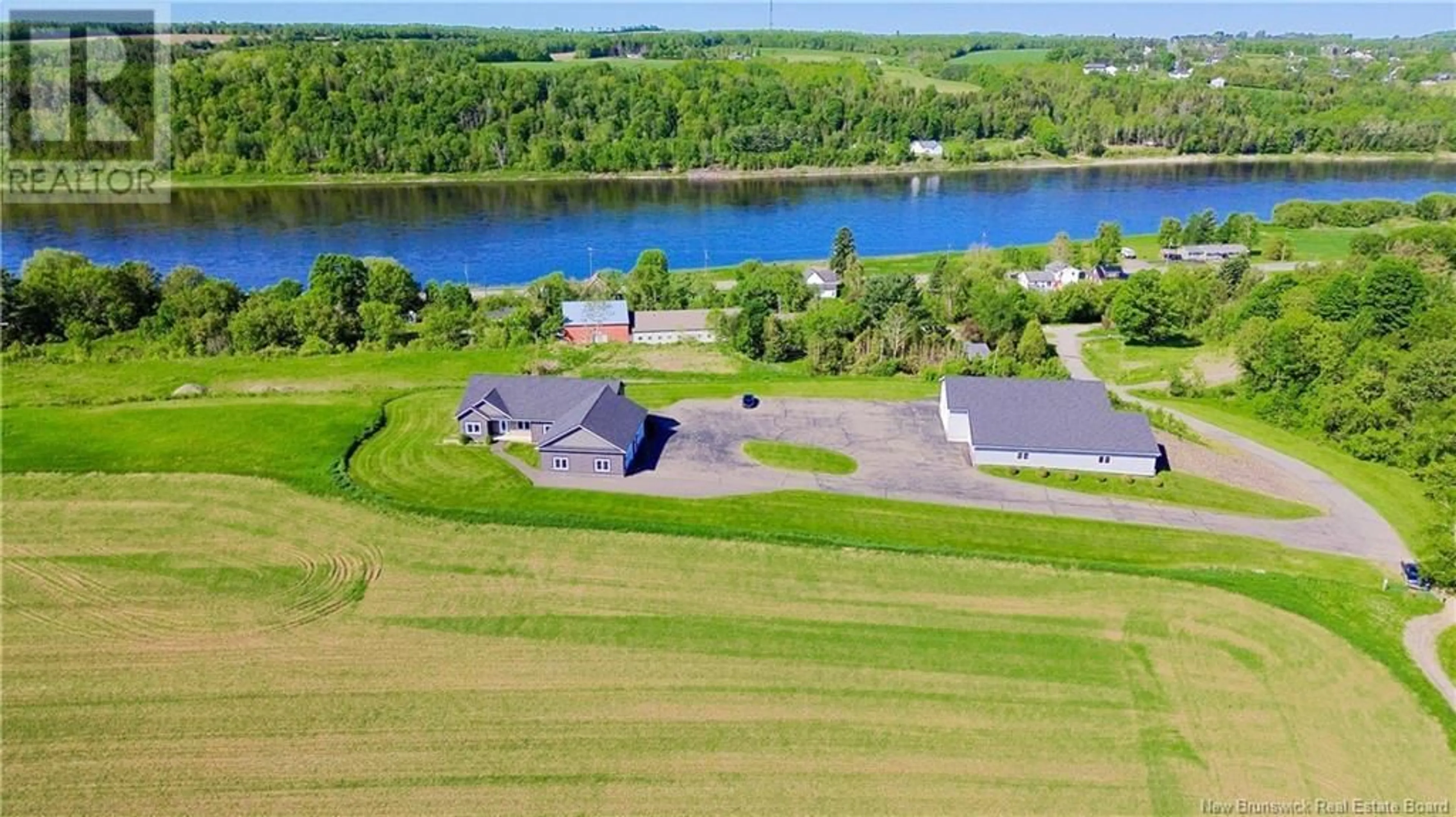 A pic from outside/outdoor area/front of a property/back of a property/a pic from drone, water/lake/river/ocean view for 52 MCMULLIN ROAD, Hartland New Brunswick E7P2R7