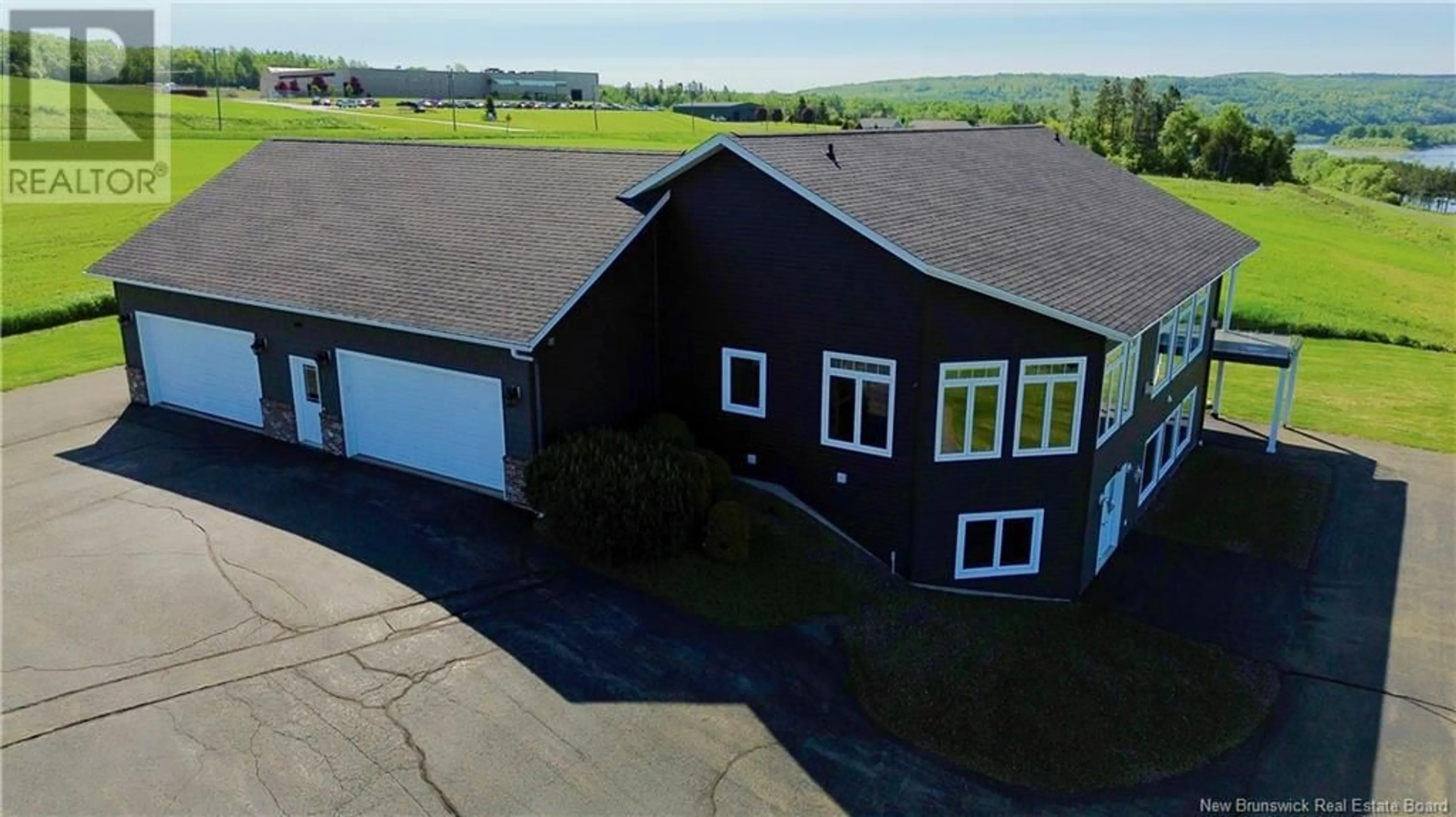 A pic from outside/outdoor area/front of a property/back of a property/a pic from drone, unknown for 52 MCMULLIN ROAD, Hartland New Brunswick E7P2R7