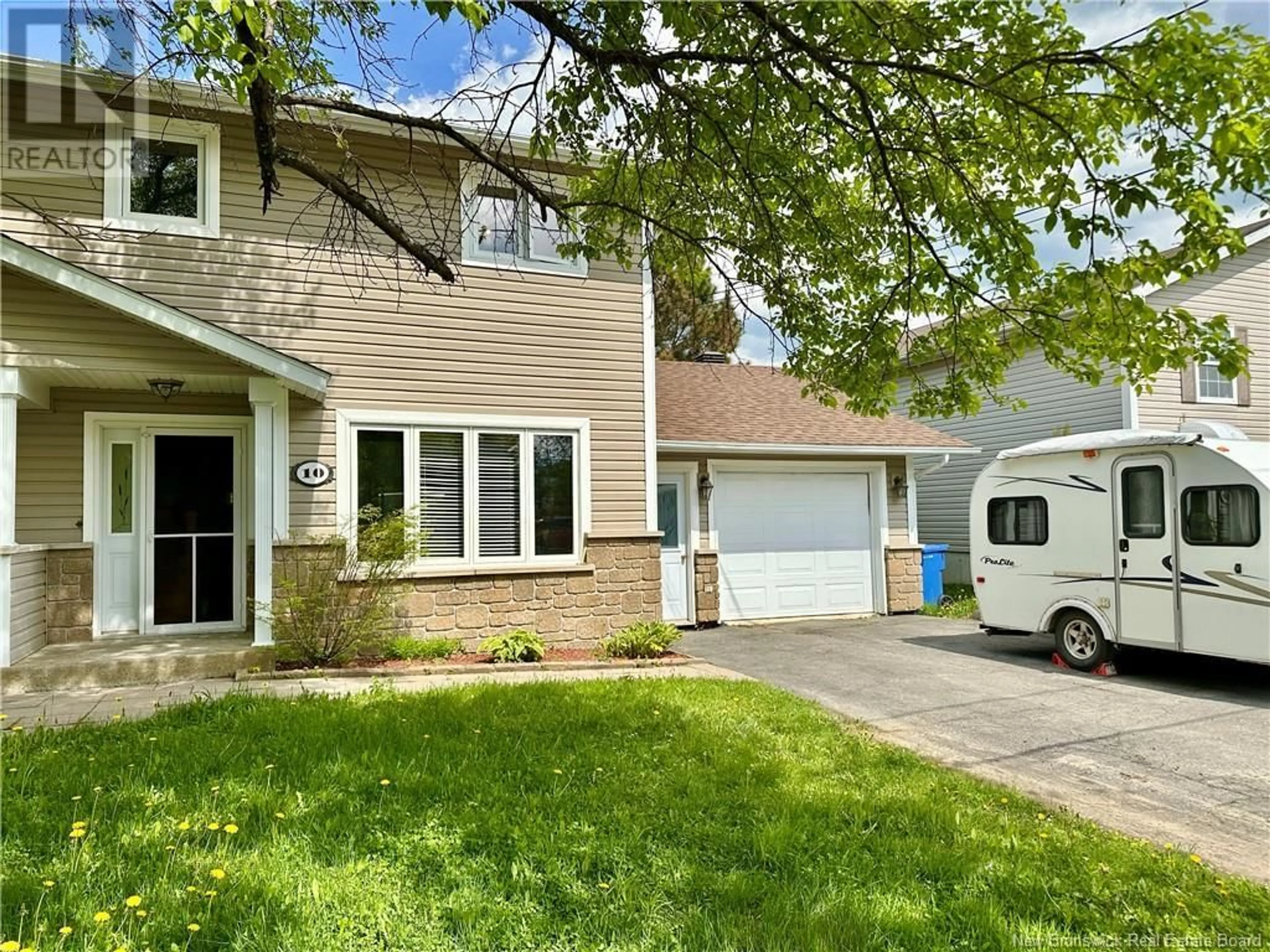 Home with vinyl exterior material, street for 10 BELONE STREET, Edmundston New Brunswick E7B1B6
