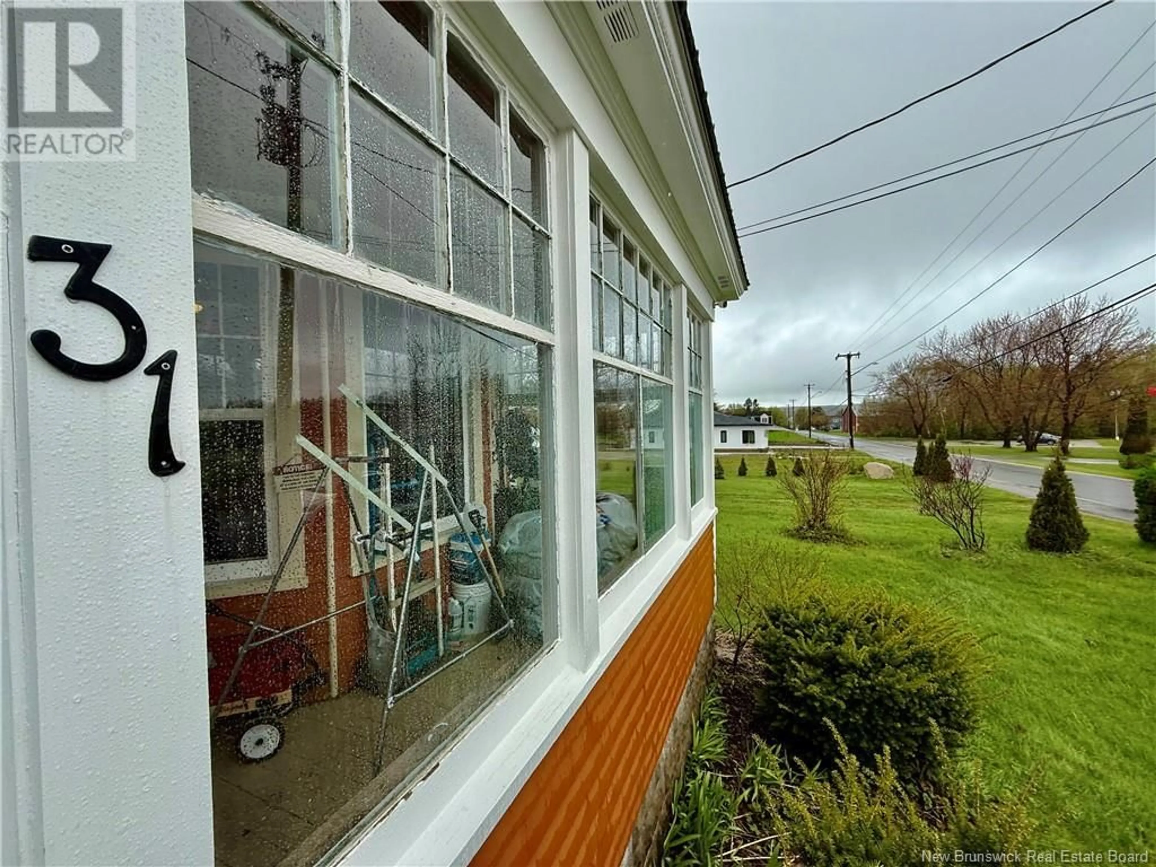 A pic from outside/outdoor area/front of a property/back of a property/a pic from drone, unknown for 31 MANSE STREET, Loggieville New Brunswick E1N4H5