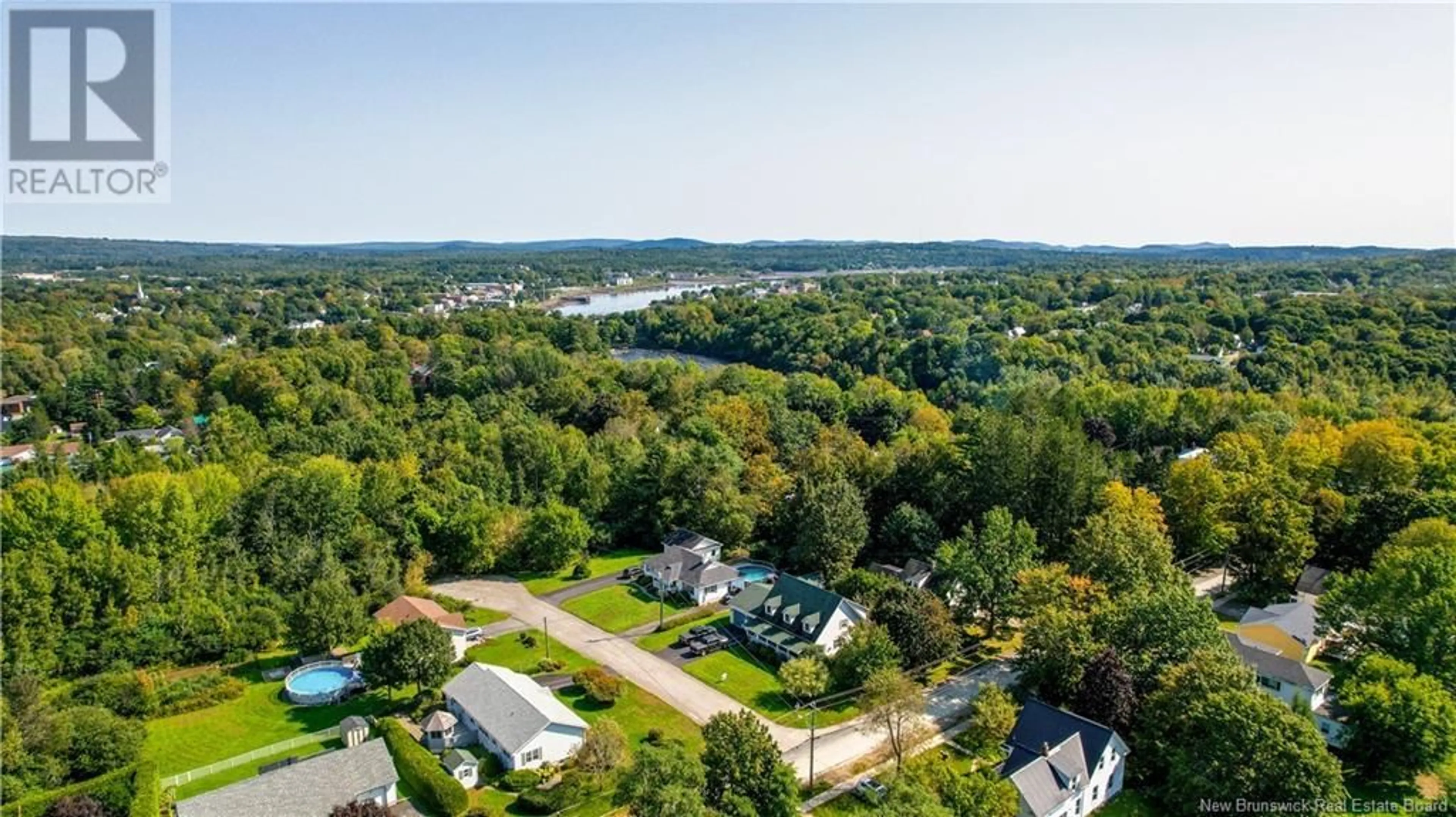 A pic from outside/outdoor area/front of a property/back of a property/a pic from drone, water/lake/river/ocean view for 1 CLARK COURT, St. Stephen New Brunswick E3L3E4