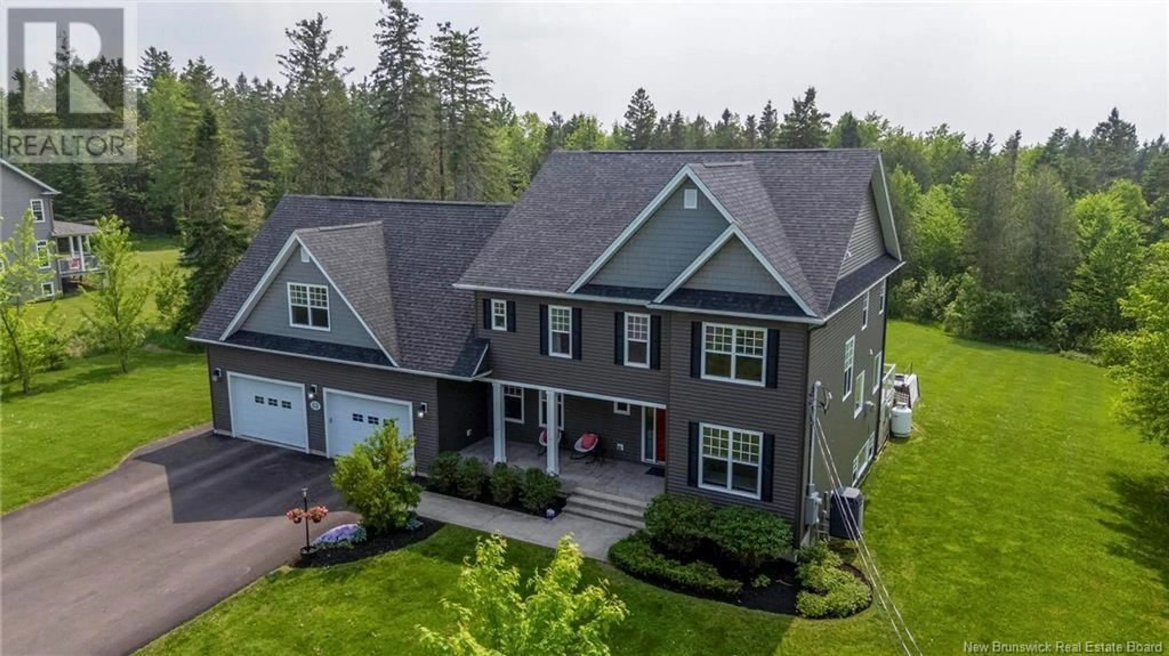 A pic from outside/outdoor area/front of a property/back of a property/a pic from drone, street for 69 RODEO WAY, Lutes Mountain New Brunswick E1G0B6