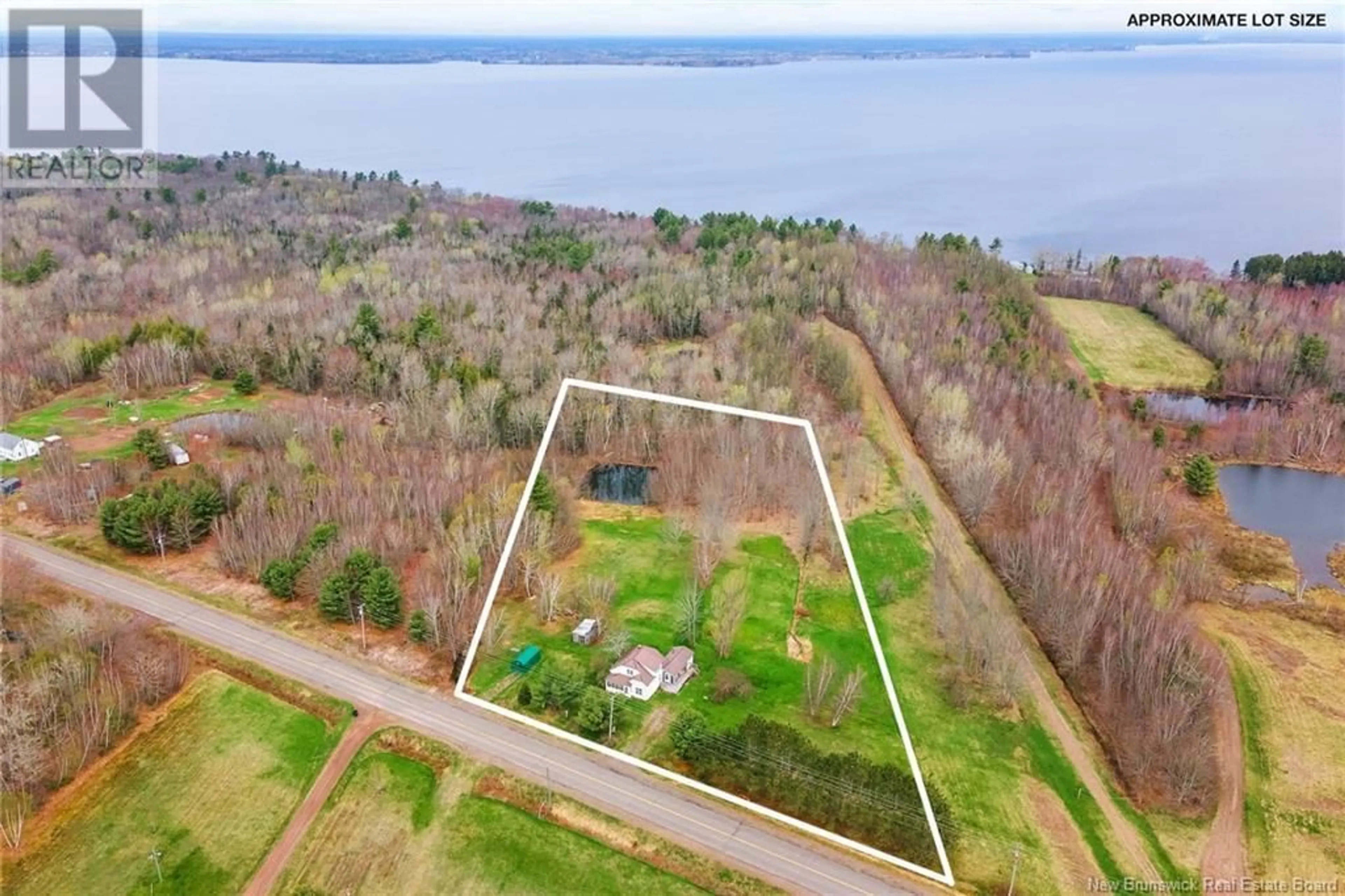 A pic from outside/outdoor area/front of a property/back of a property/a pic from drone, water/lake/river/ocean view for 5411 105 ROUTE, Whites Cove New Brunswick E4C3H7