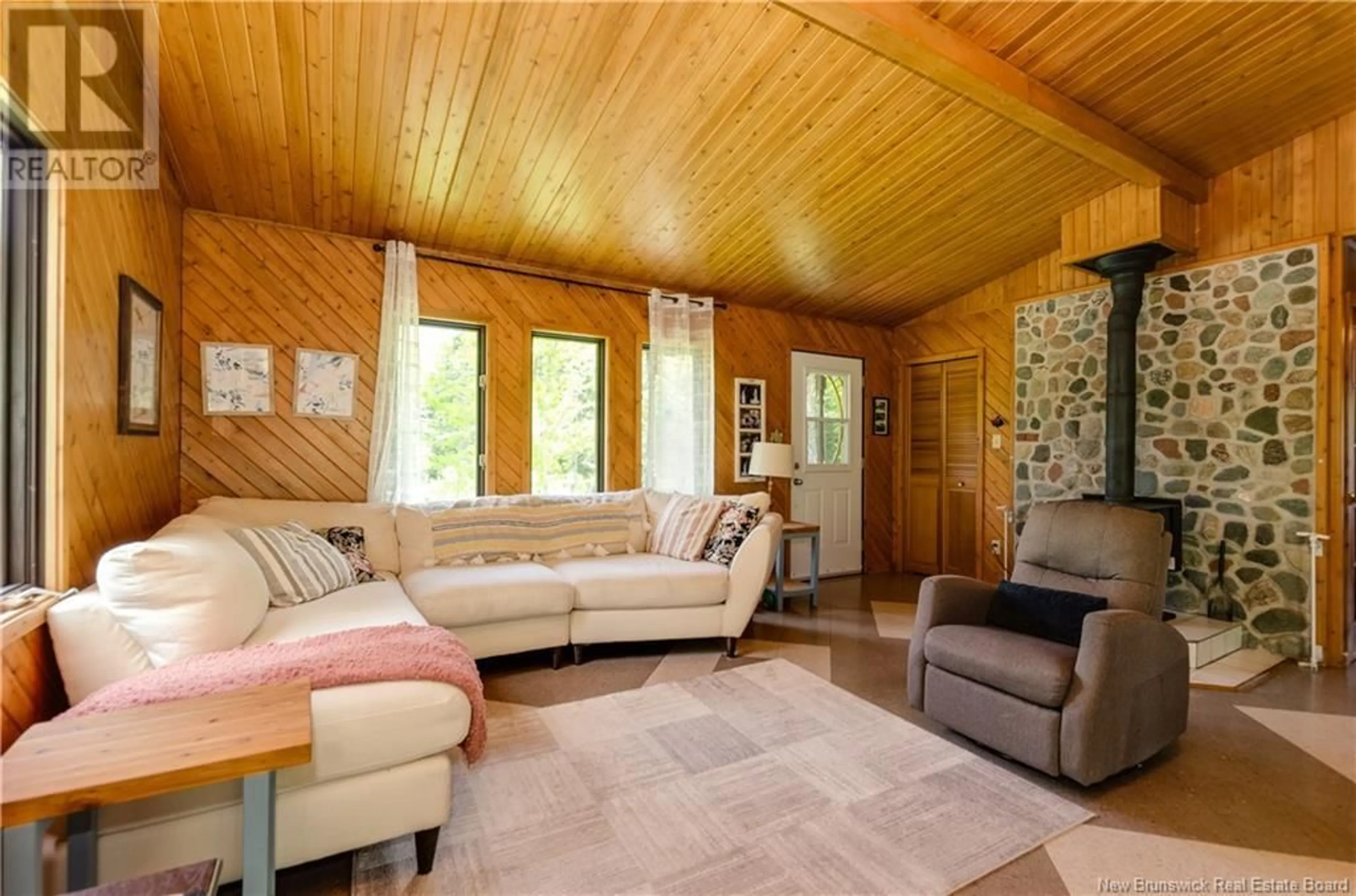 Living room with furniture, wood/laminate floor for 30 SPURR ROAD, Harewood New Brunswick E4Z5T5