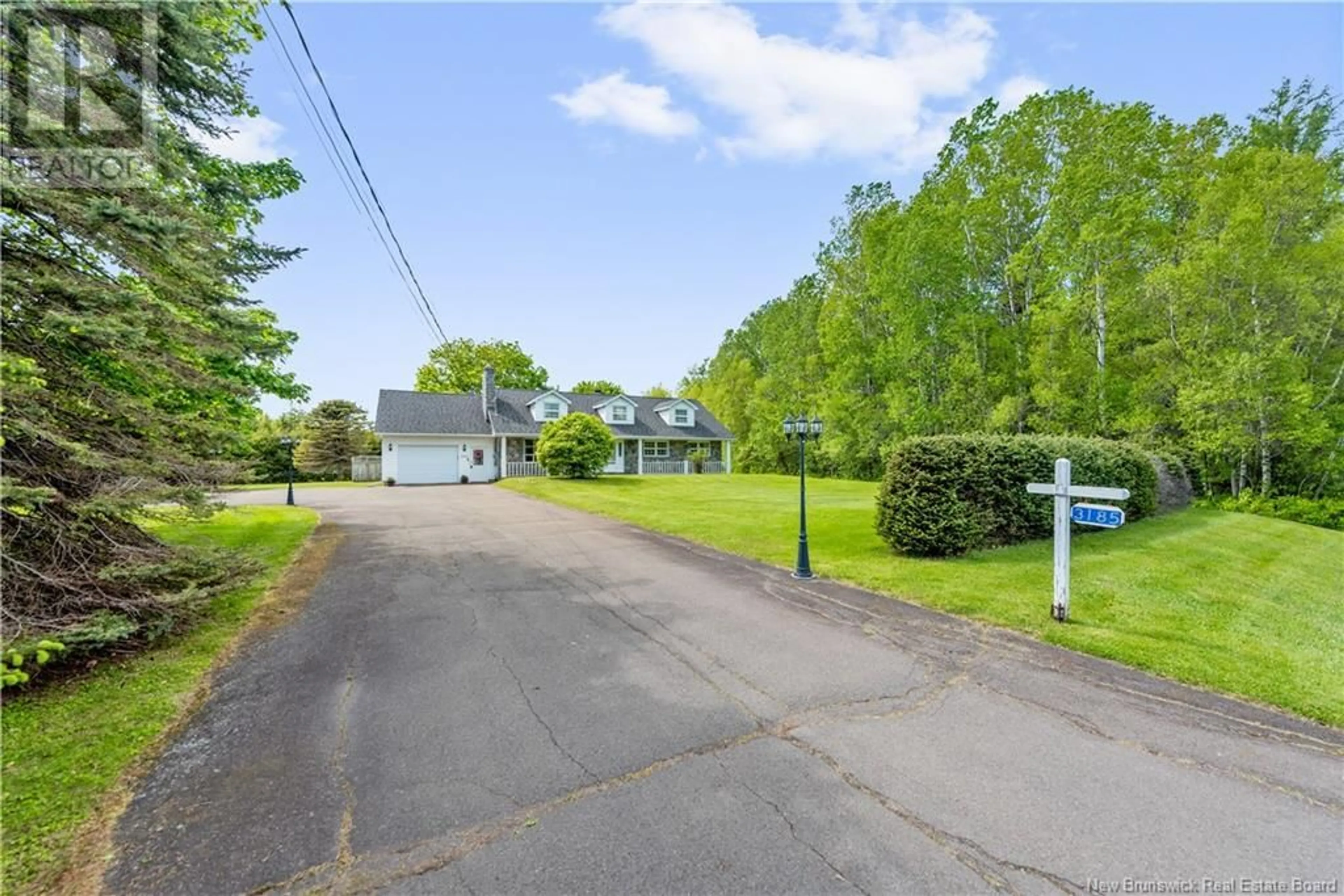 A pic from outside/outdoor area/front of a property/back of a property/a pic from drone, street for 3185 ROUTE 132, Scoudouc New Brunswick E4P3R8