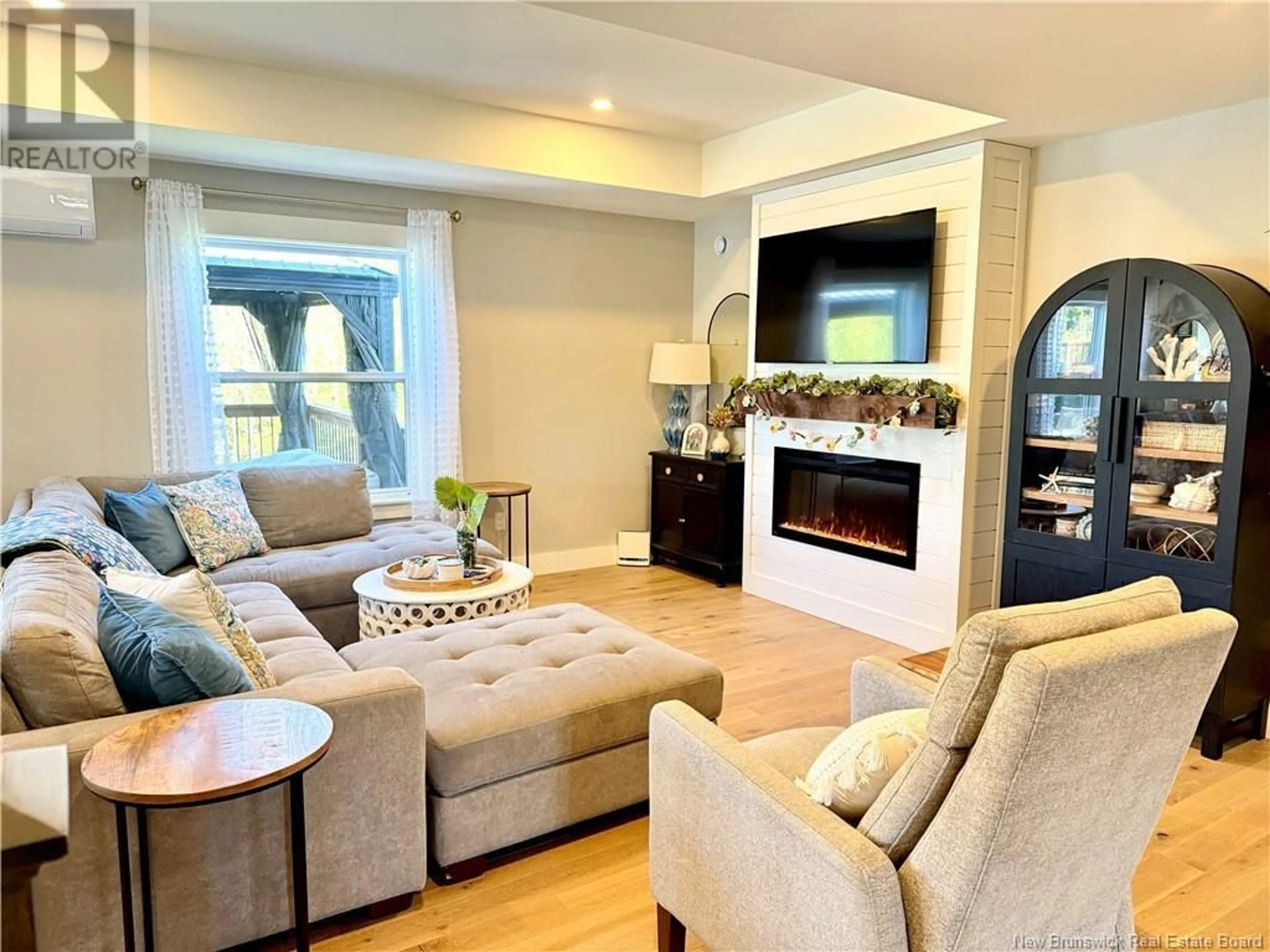Living room with furniture, unknown for 55 MEADOWLARK DRIVE, Quispamsis New Brunswick E2E0T6