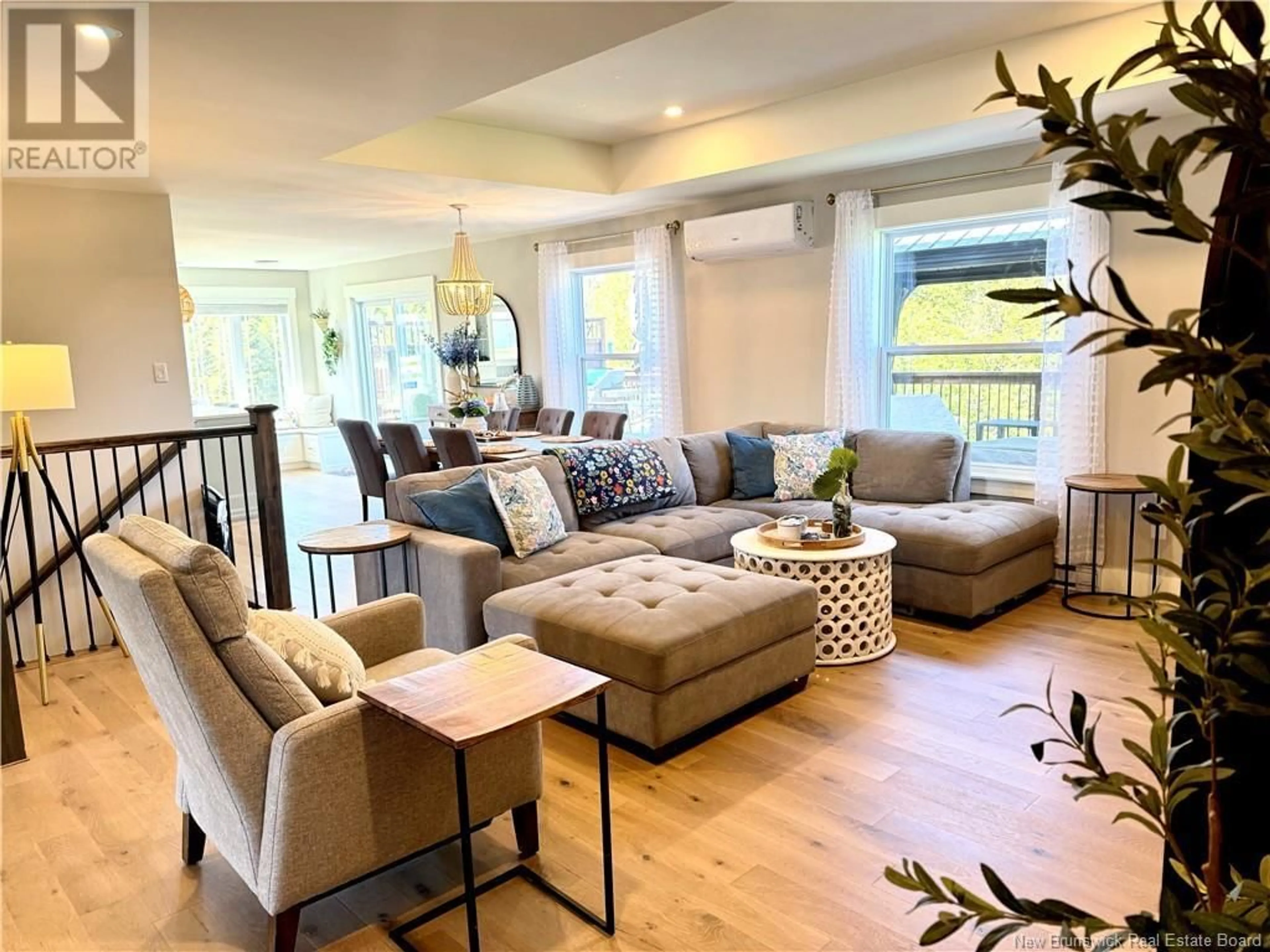 Living room with furniture, wood/laminate floor for 55 MEADOWLARK DRIVE, Quispamsis New Brunswick E2E0T6