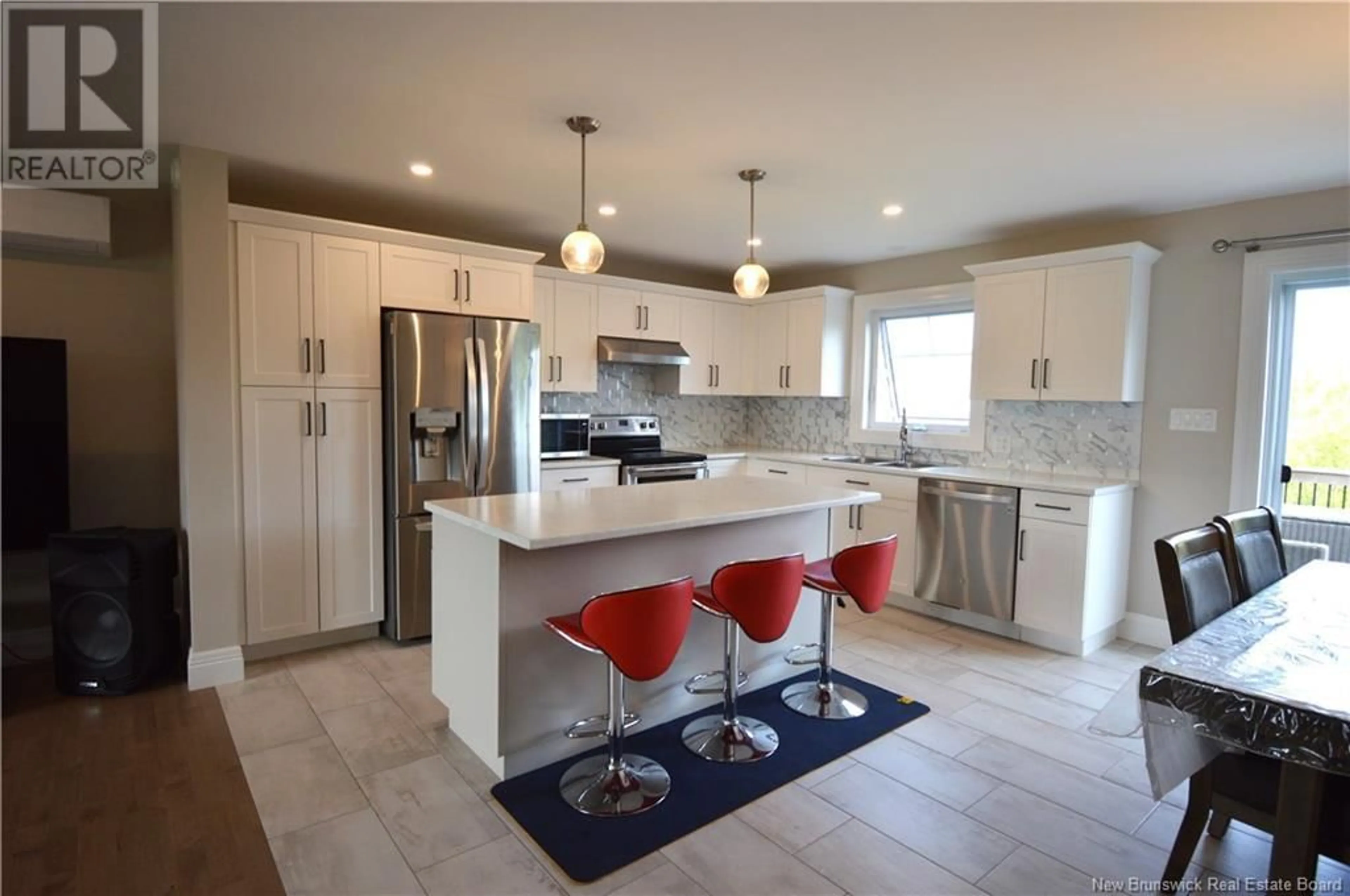 Open concept kitchen, ceramic/tile floor for 6 DOMINIQUE STREET, Shediac New Brunswick E4P0S2