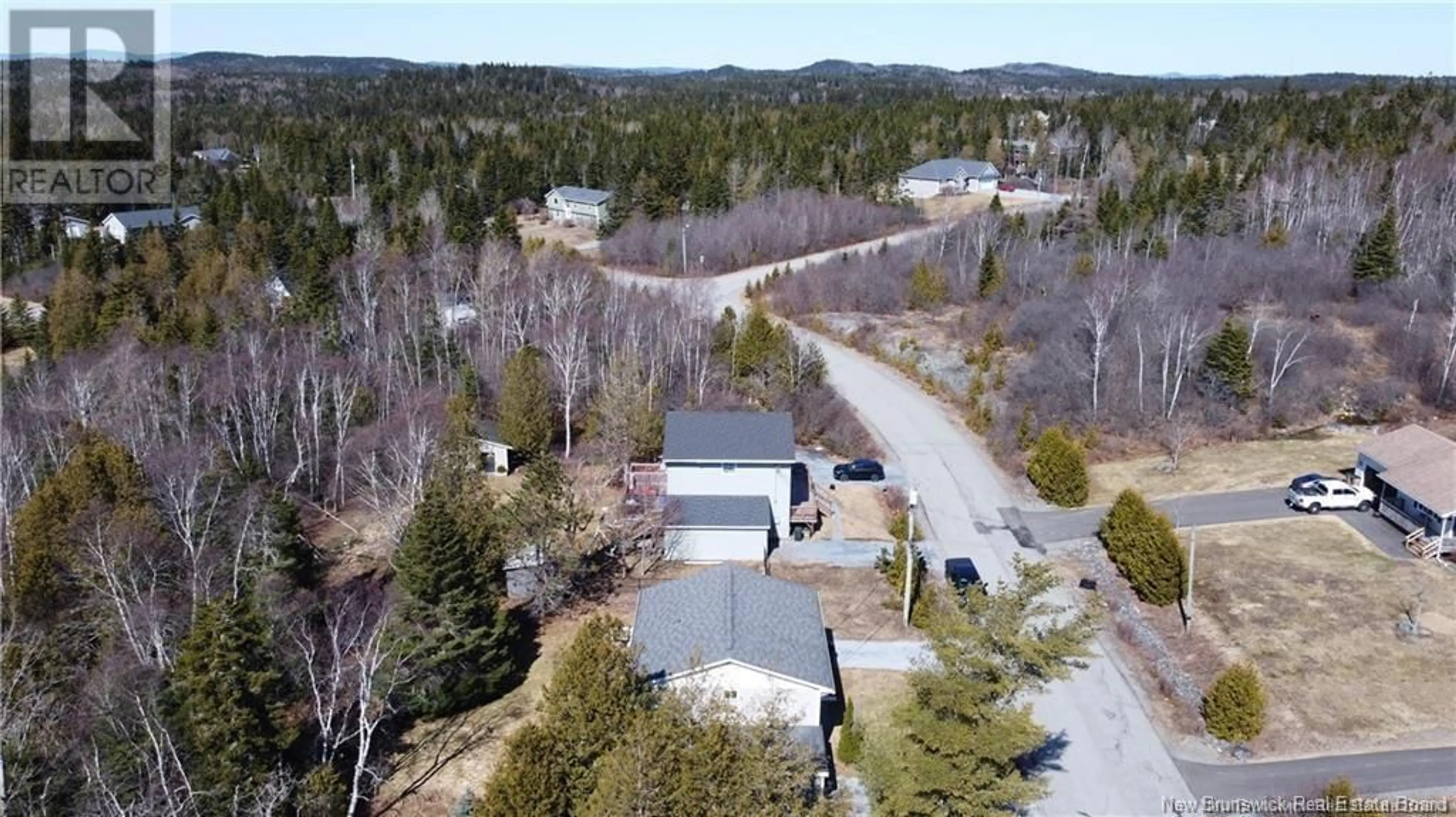 A pic from outside/outdoor area/front of a property/back of a property/a pic from drone, forest/trees view for 29 & 31 FORIERE DRIVE, Saint John New Brunswick E2N1J4