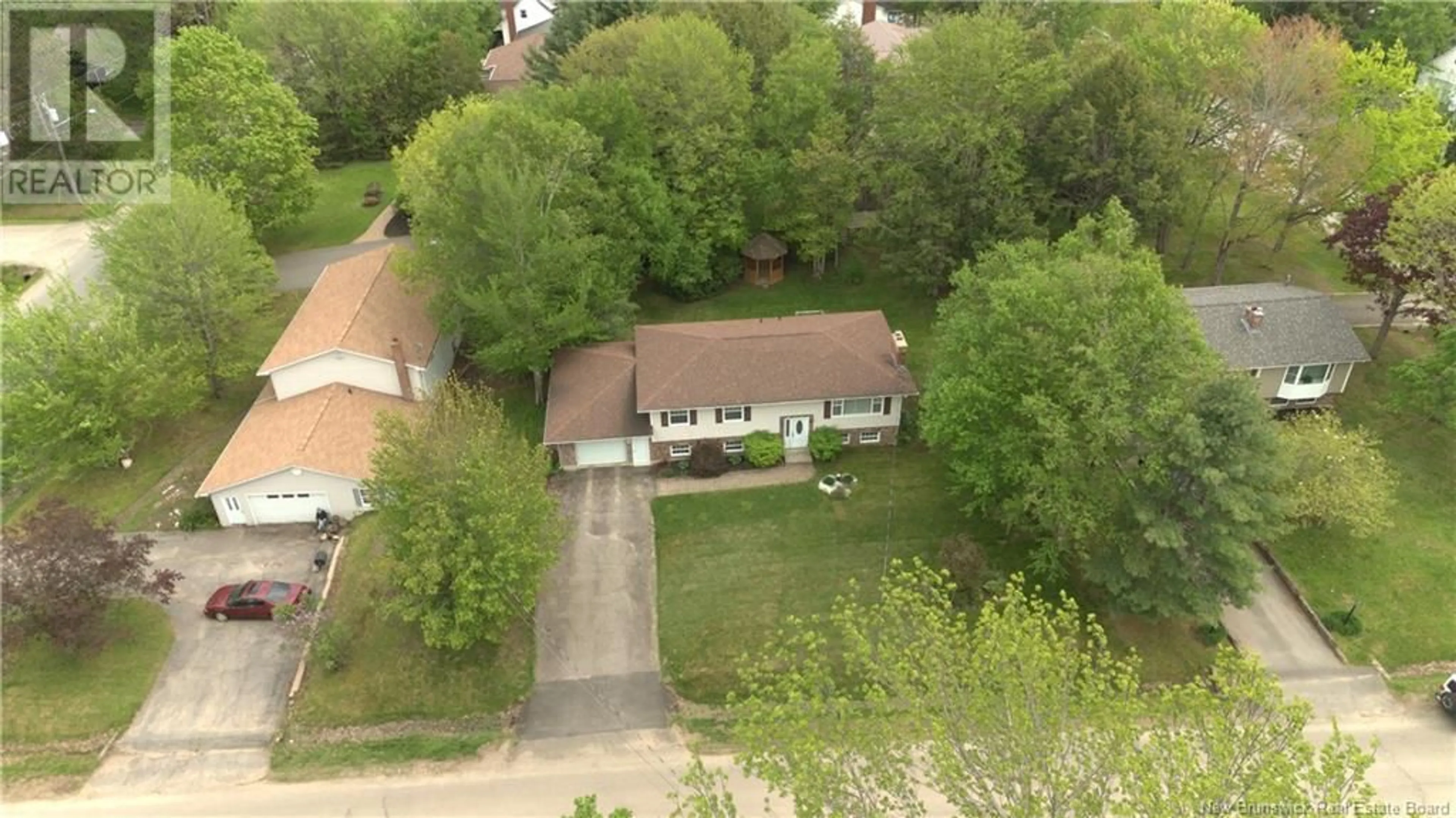 A pic from outside/outdoor area/front of a property/back of a property/a pic from drone, street for 9 SINCLAIR LANE, New Maryland New Brunswick E3C1J2