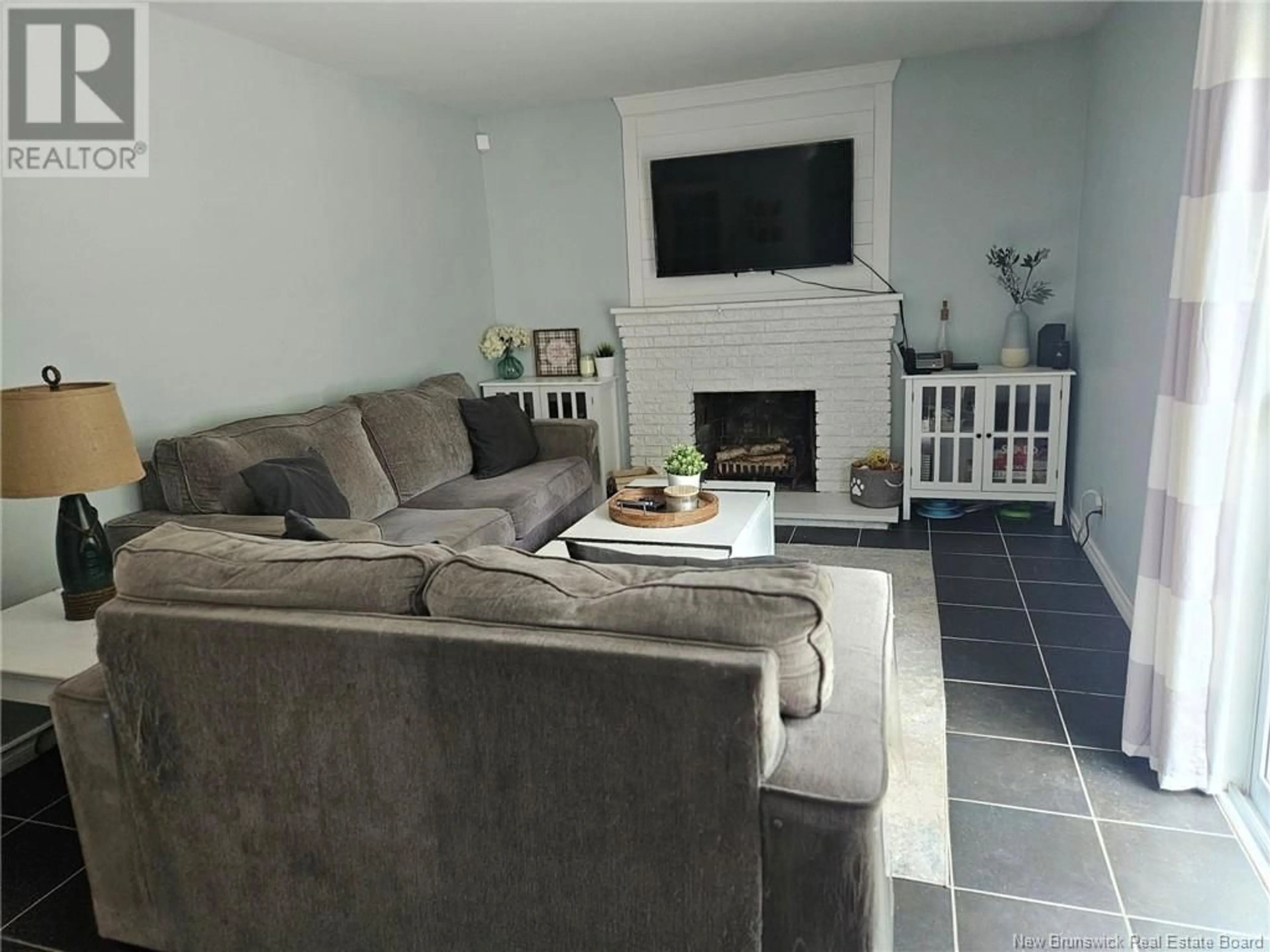 Living room with furniture, unknown for 47 LAIRD AVENUE, Moncton New Brunswick E1E2P2