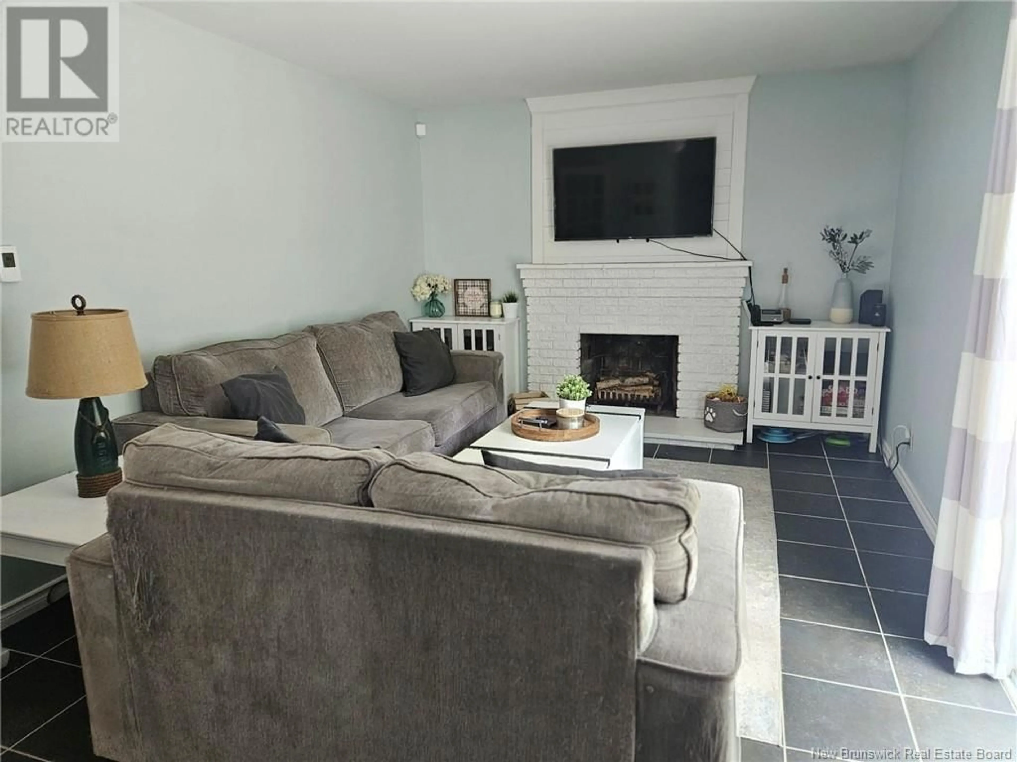 Living room with furniture, unknown for 47 LAIRD AVENUE, Moncton New Brunswick E1E2P2