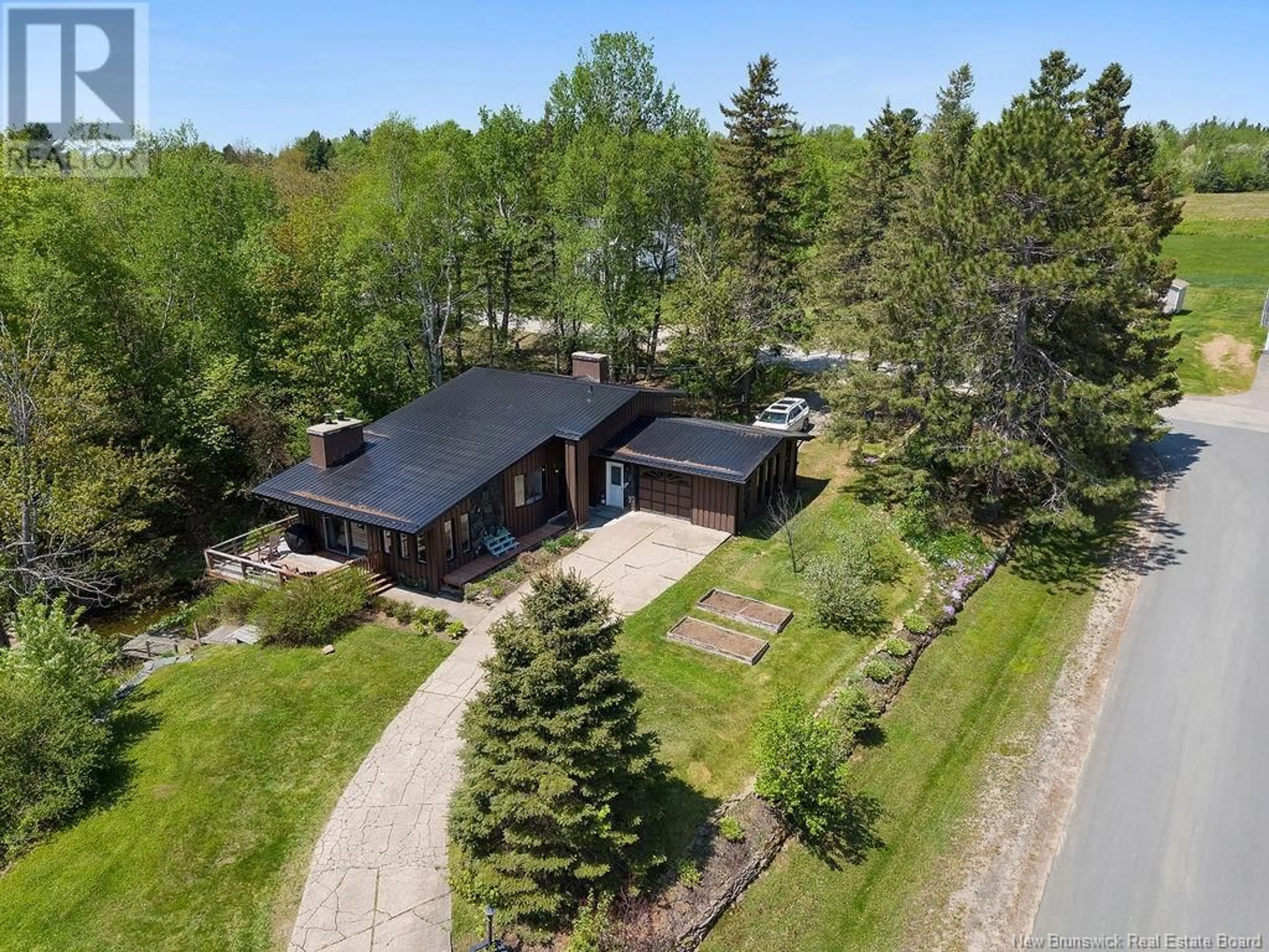 A pic from outside/outdoor area/front of a property/back of a property/a pic from drone, street for 142 CENTURY DRIVE, Miramichi New Brunswick E1V7A4