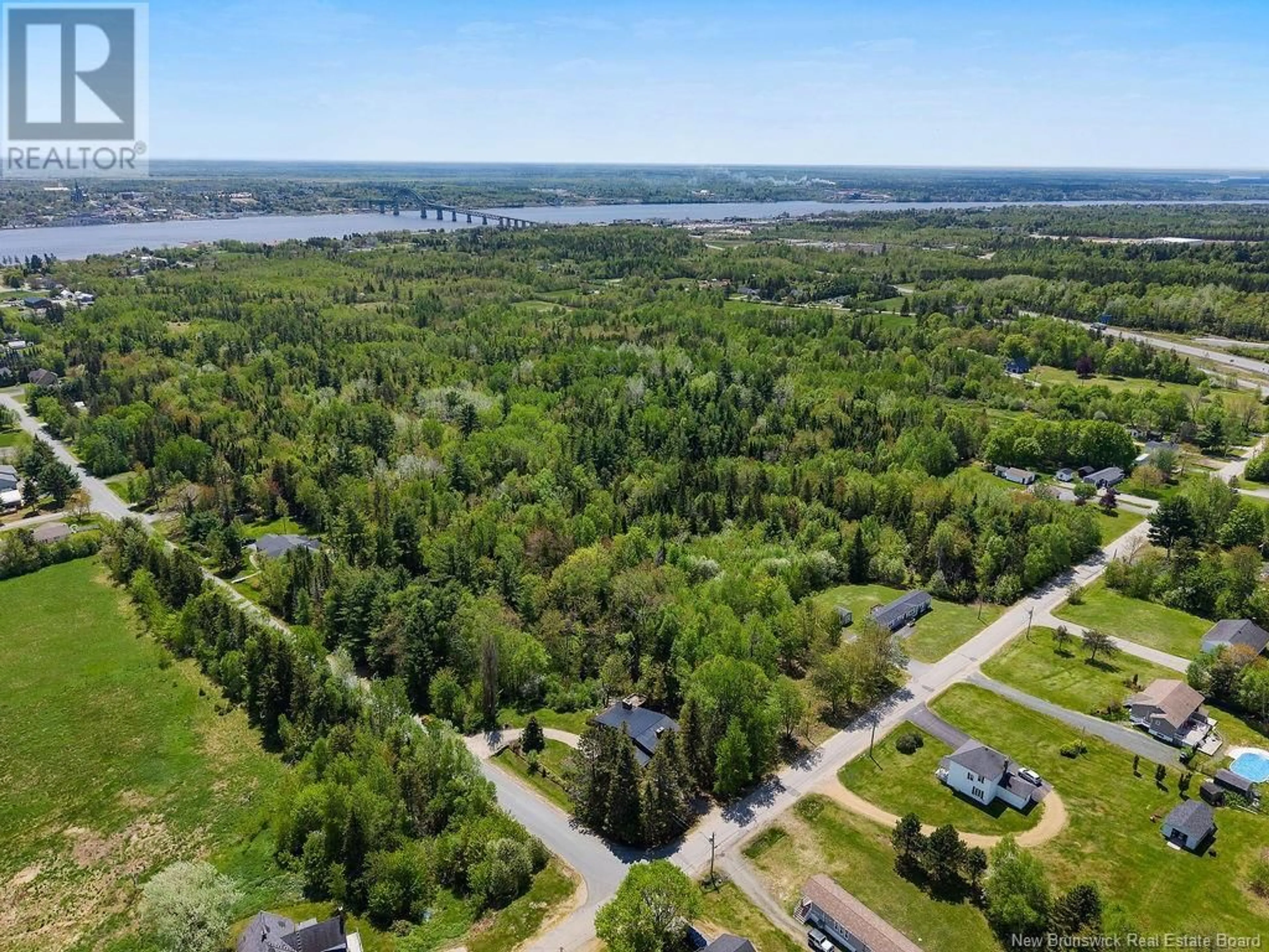 A pic from outside/outdoor area/front of a property/back of a property/a pic from drone, water/lake/river/ocean view for 142 CENTURY DRIVE, Miramichi New Brunswick E1V7A4