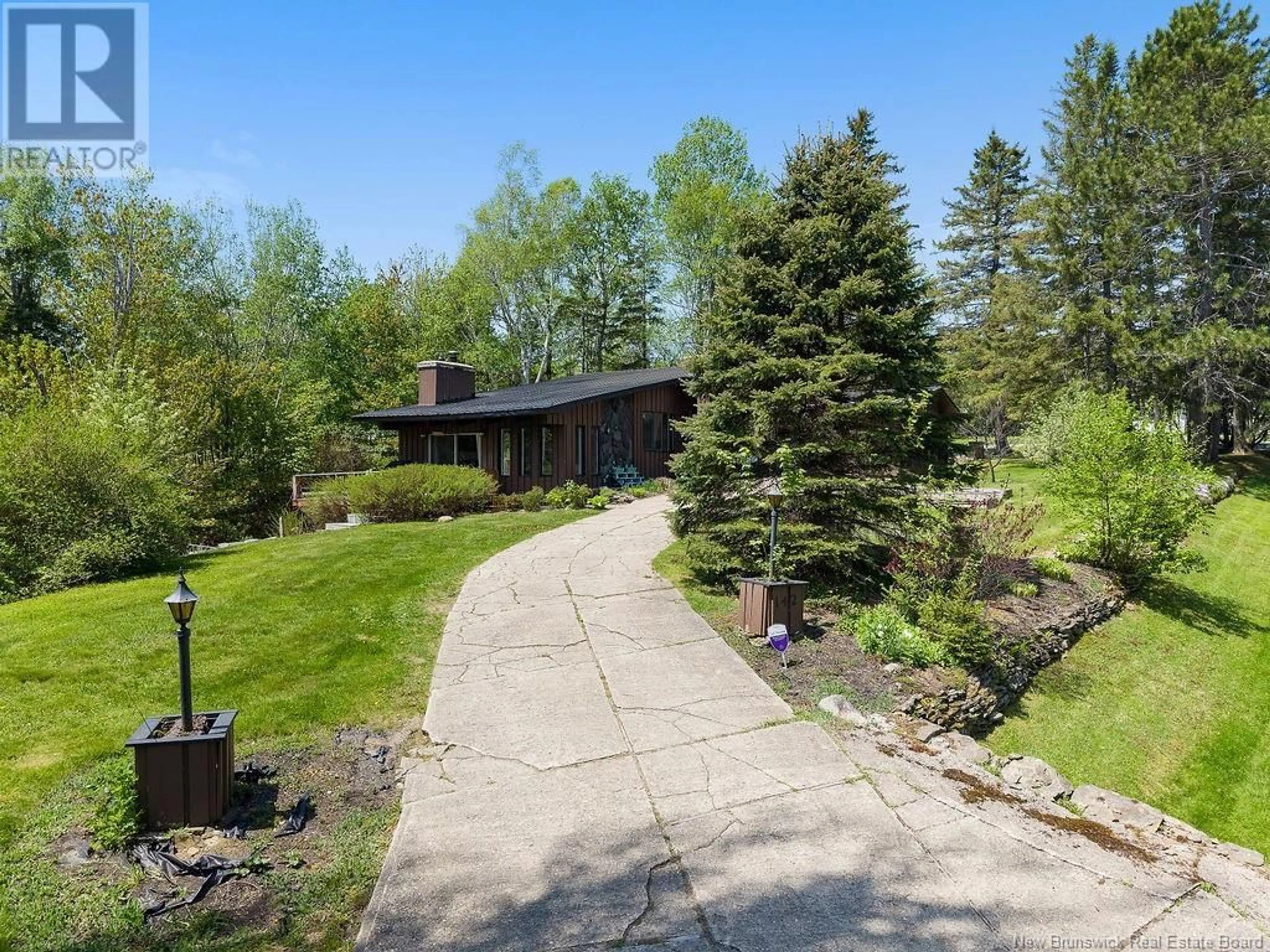 A pic from outside/outdoor area/front of a property/back of a property/a pic from drone, unknown for 142 CENTURY DRIVE, Miramichi New Brunswick E1V7A4
