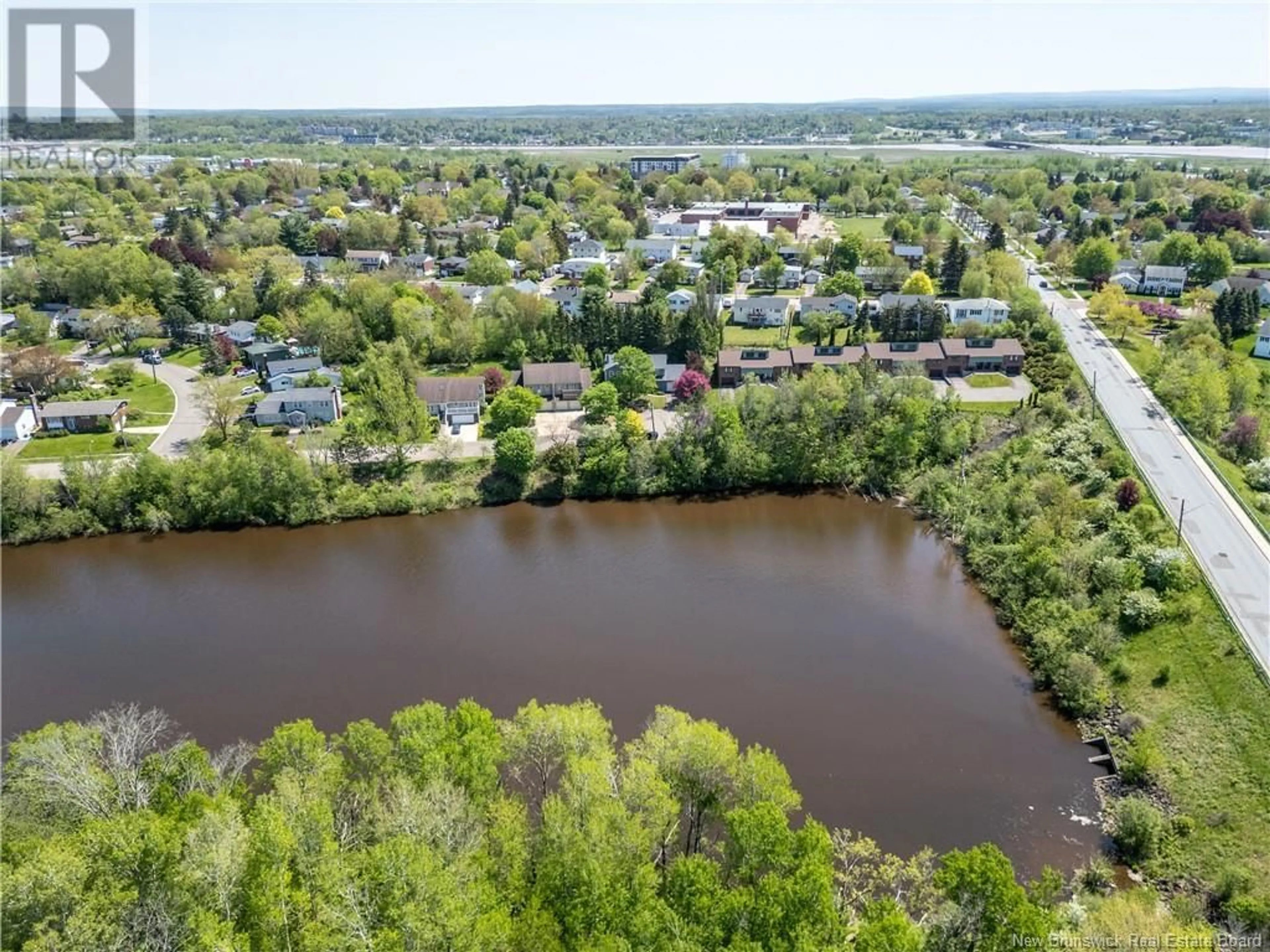 A pic from outside/outdoor area/front of a property/back of a property/a pic from drone, water/lake/river/ocean view for 398 WESTMOUNT BOULEVARD, Moncton New Brunswick E1E4K3