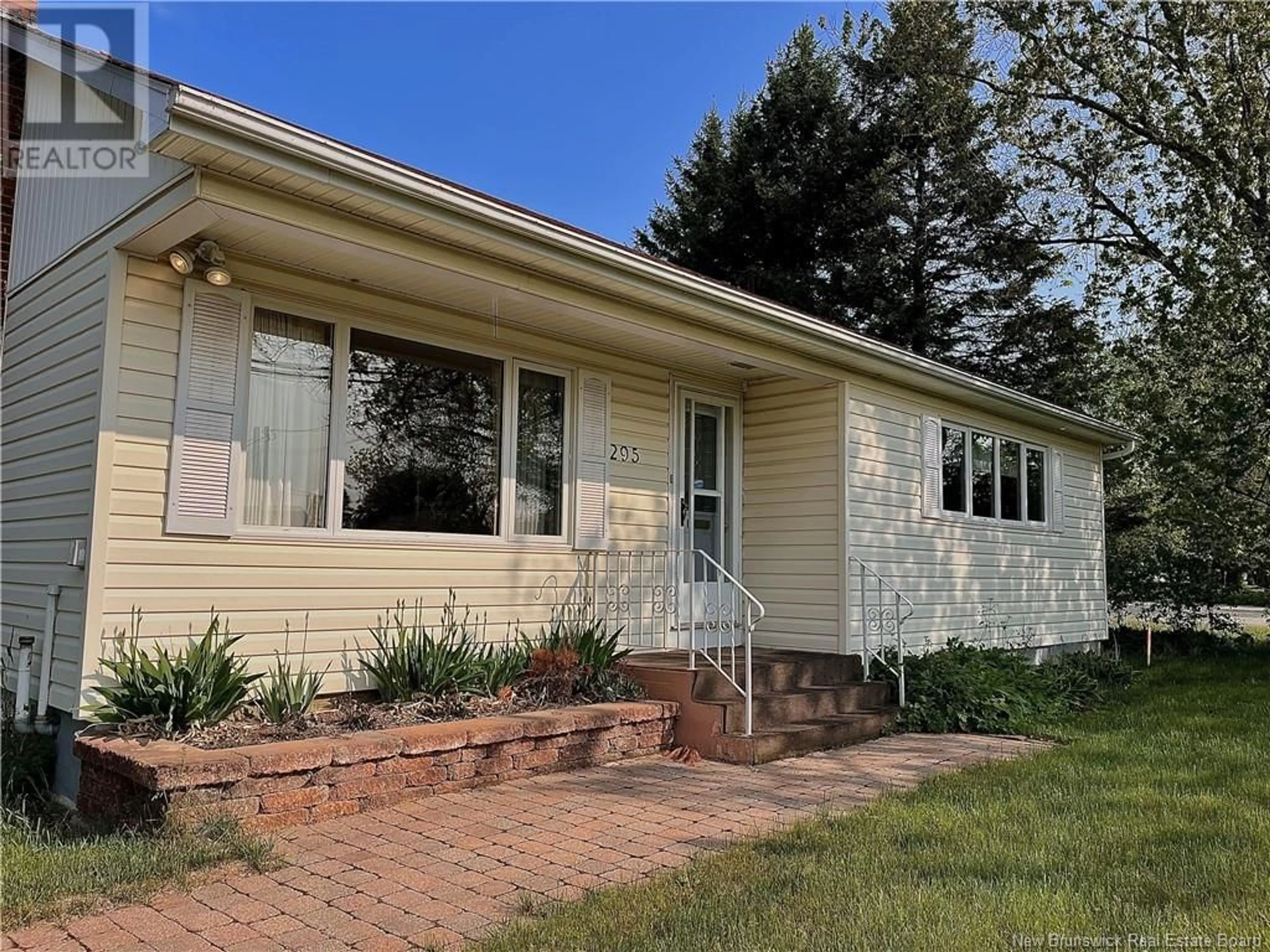 Home with vinyl exterior material, street for 295 KING GEORGE HWY, Miramichi New Brunswick E1V1L2