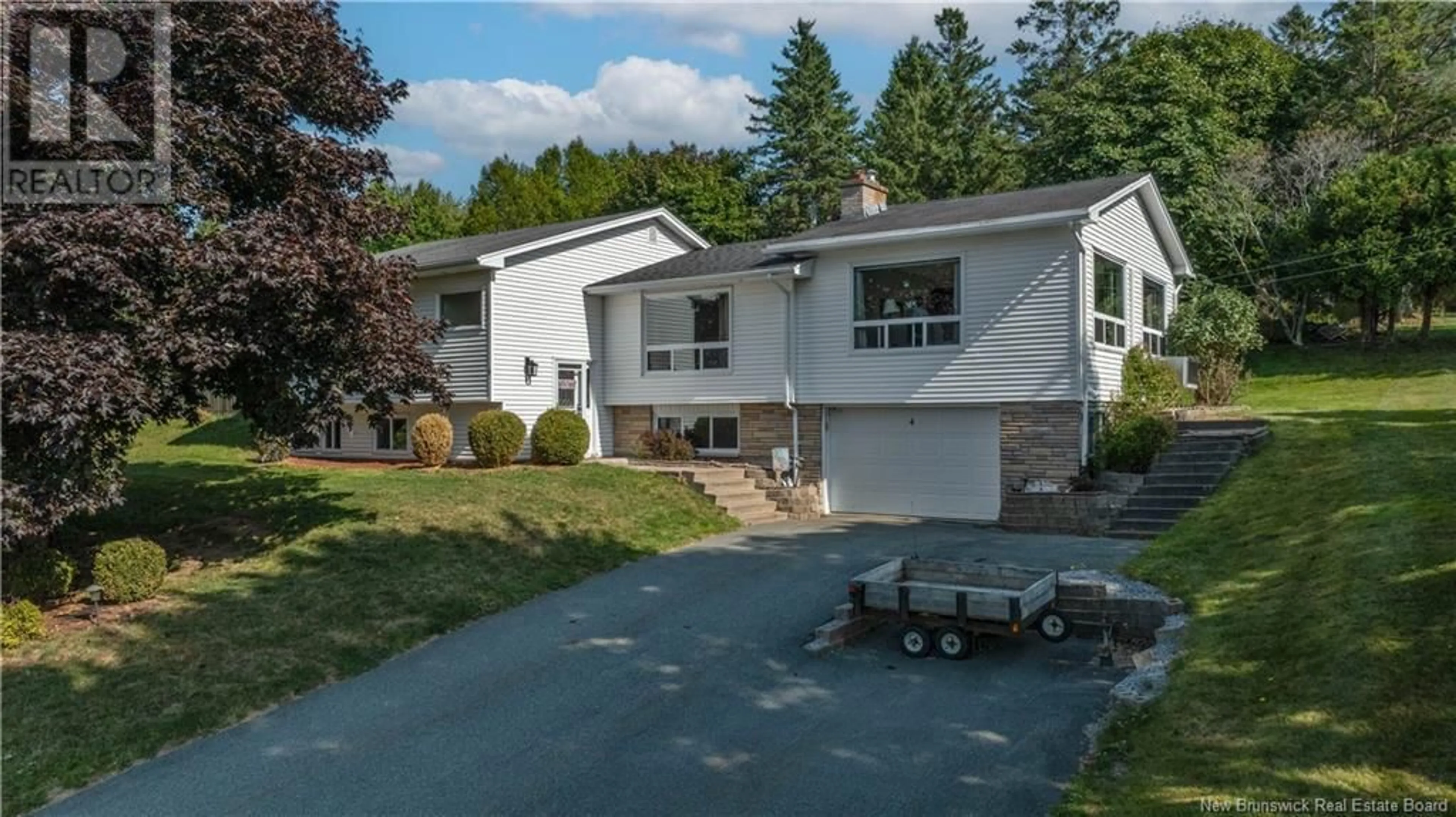 Home with vinyl exterior material, street for 4 KANE ROAD, Quispamsis New Brunswick E2E1L2