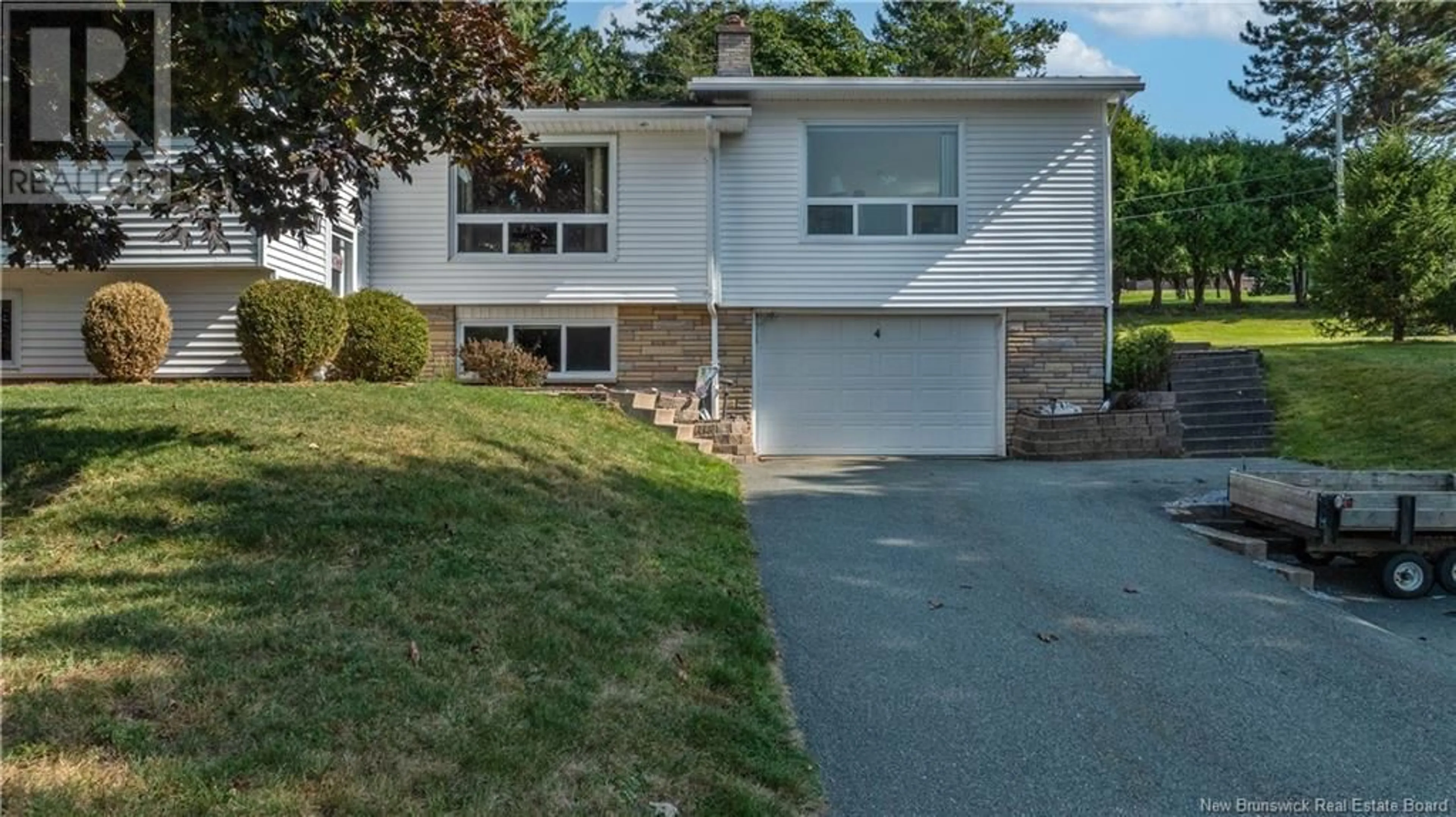 Home with vinyl exterior material, street for 4 KANE ROAD, Quispamsis New Brunswick E2E1L2