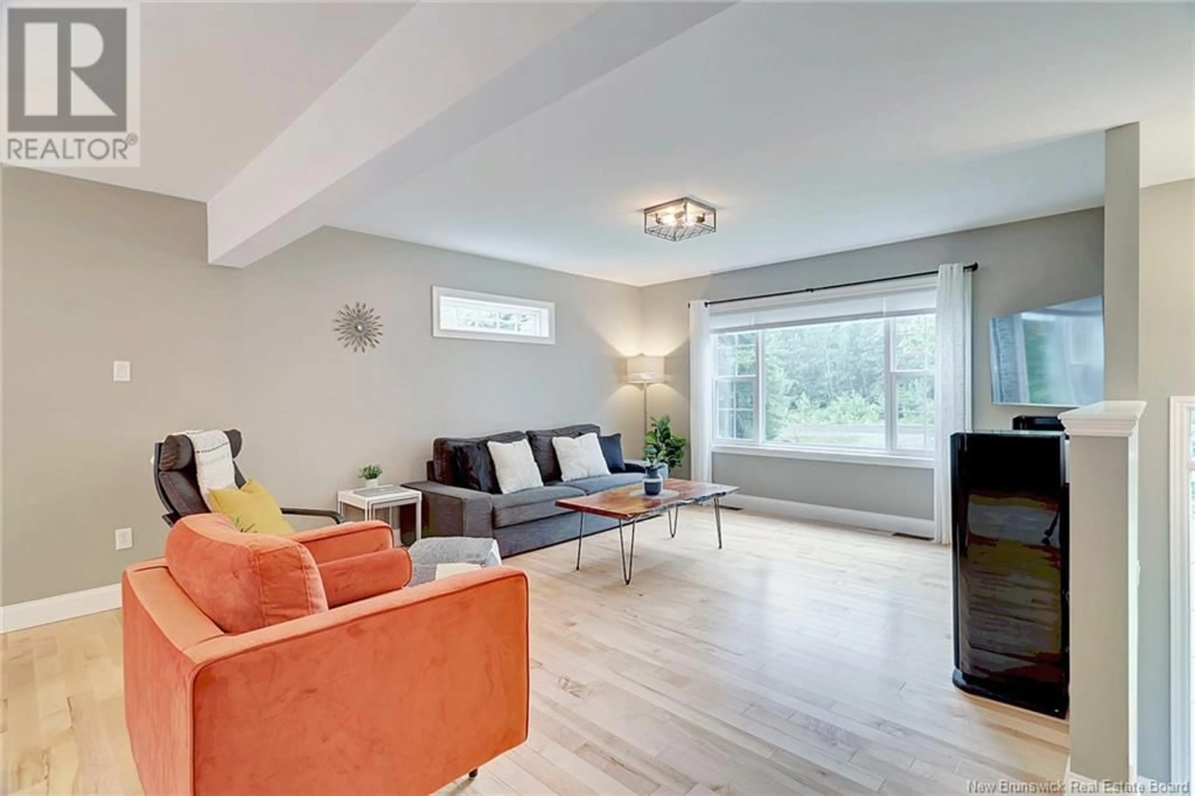 Living room with furniture, unknown for 27 ROSE OF SHARON COURT, Waasis New Brunswick E3B0B8