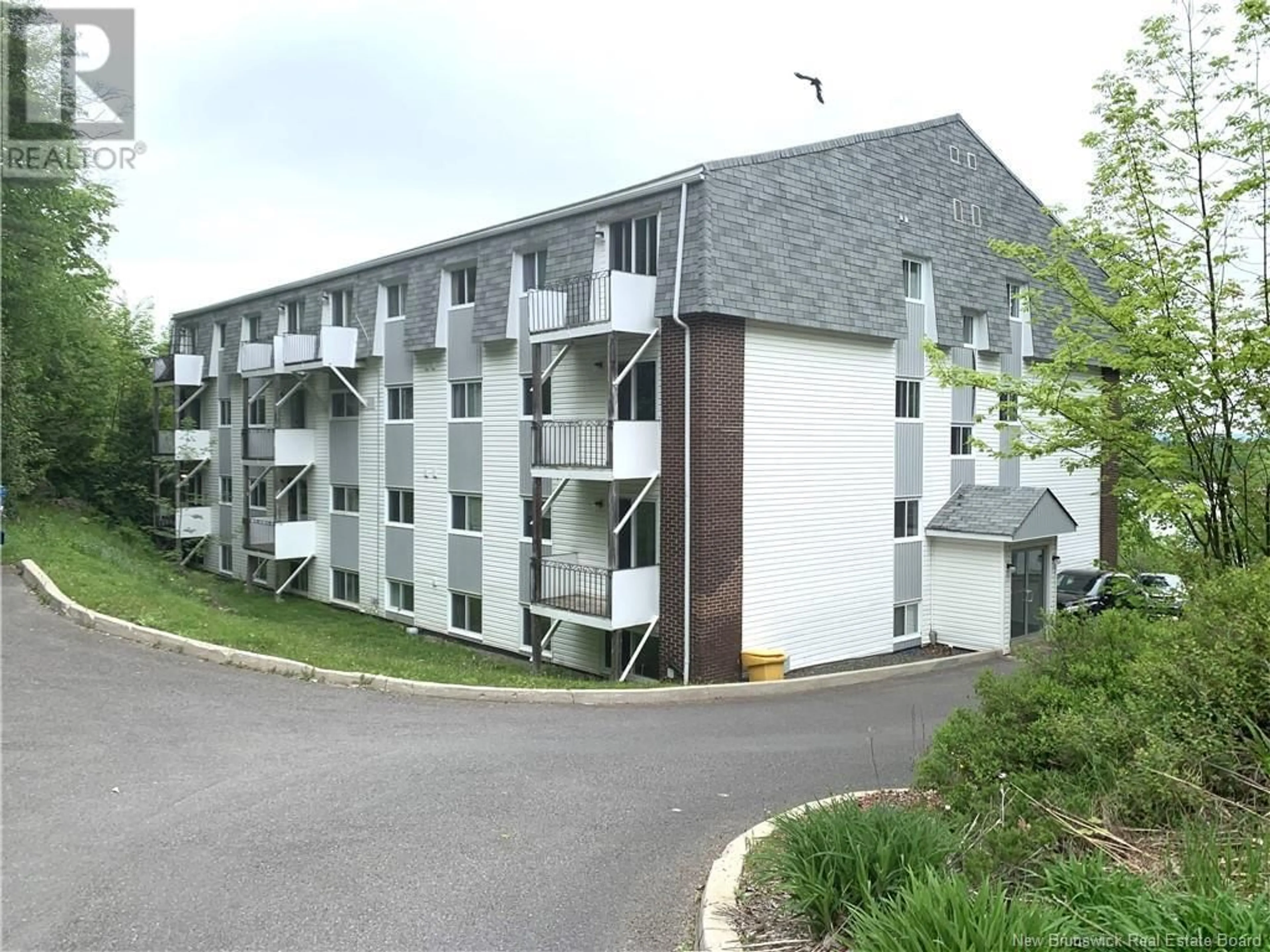 A pic from outside/outdoor area/front of a property/back of a property/a pic from drone, unknown for 1 - 228 DUNNS CROSSING ROAD, Fredericton New Brunswick E3B2A6