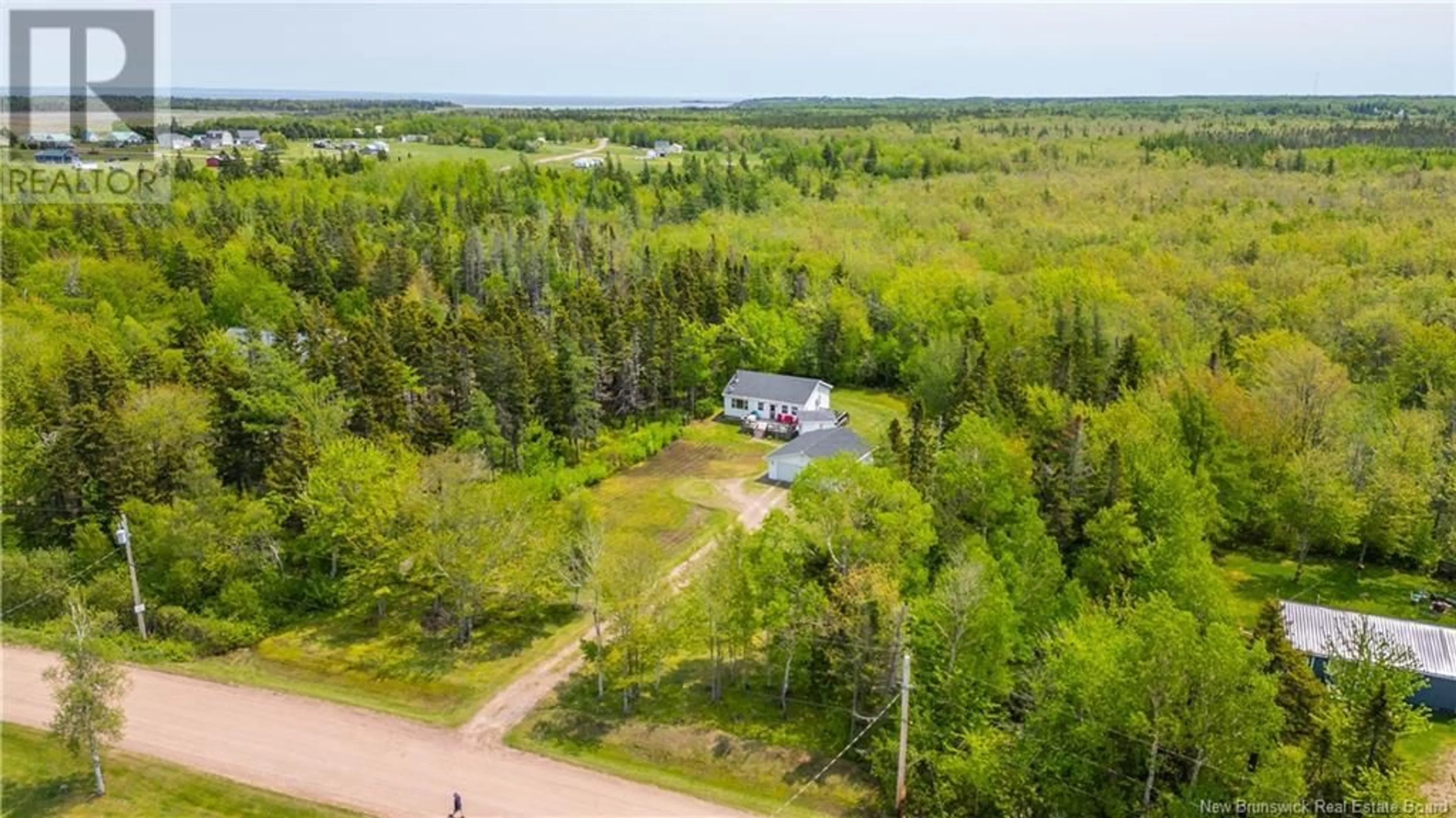 A pic from outside/outdoor area/front of a property/back of a property/a pic from drone, forest/trees view for 111 WALTON'S BEACH ROAD, Murray Corner New Brunswick E4M2M2
