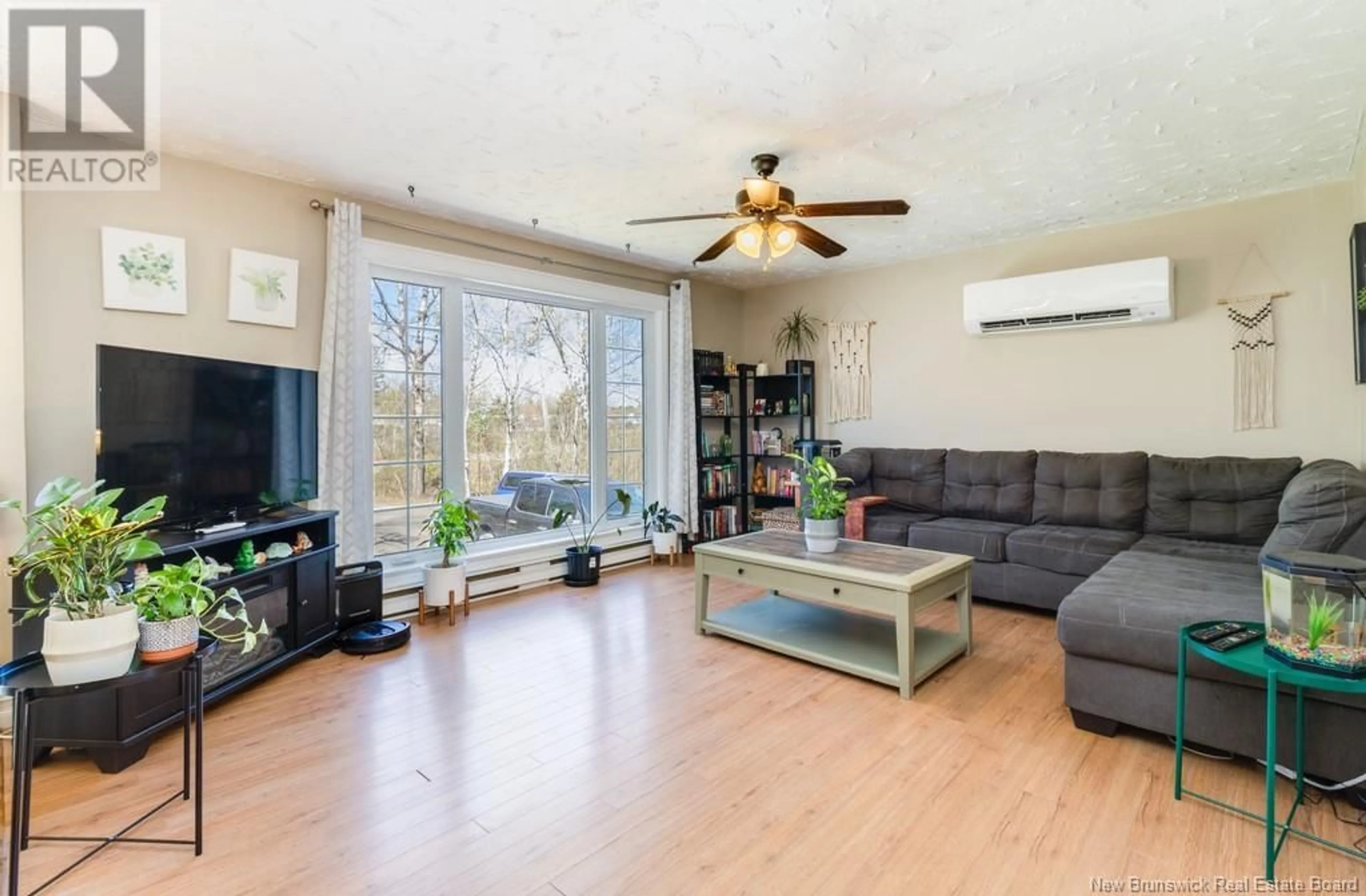 Living room with furniture, wood/laminate floor for 7 VIOLETA AVENUE, Hanwell New Brunswick E3C1Z7