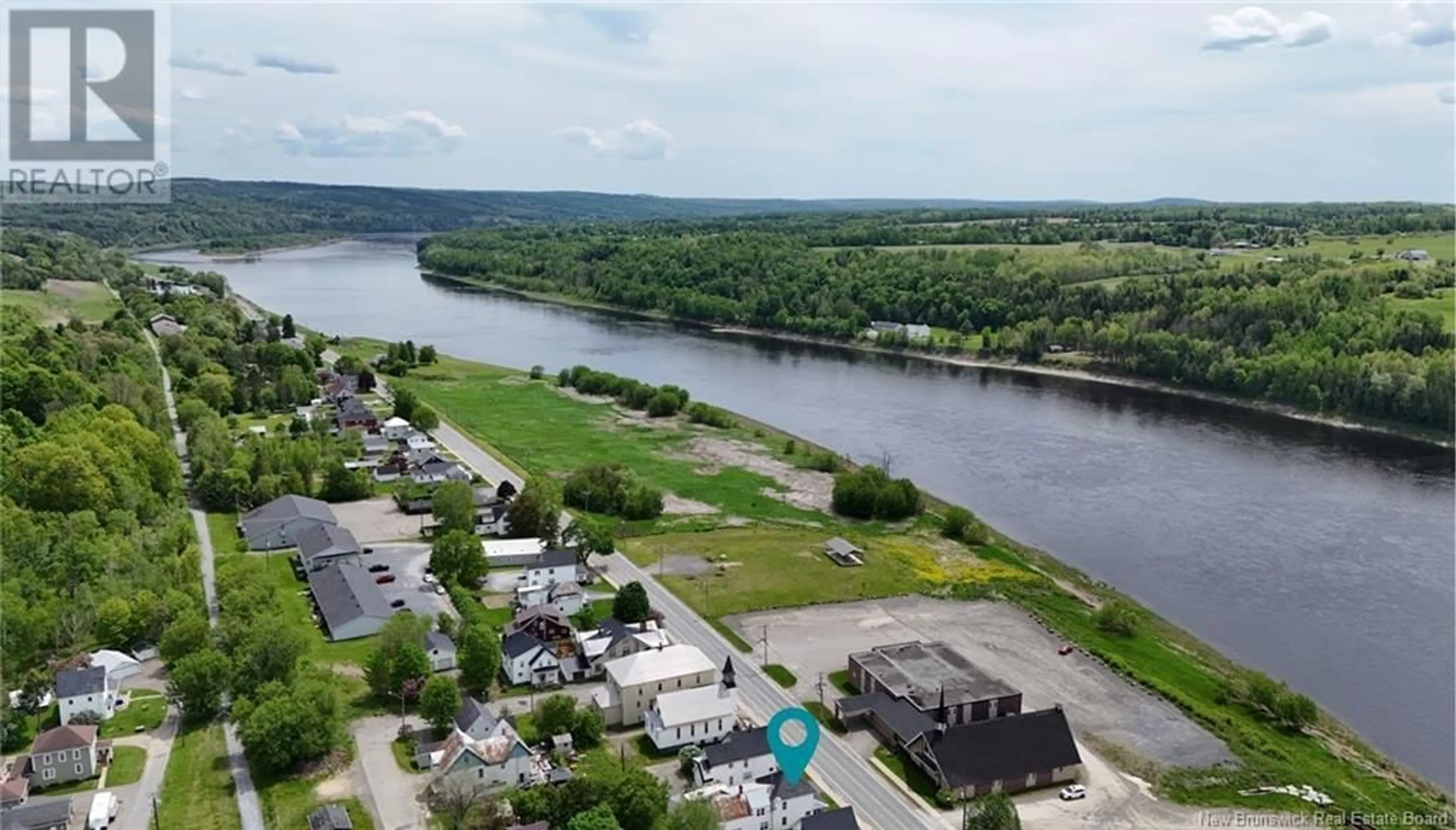 A pic from outside/outdoor area/front of a property/back of a property/a pic from drone, water/lake/river/ocean view for 354 MAIN STREET, Hartland New Brunswick E7P2M9