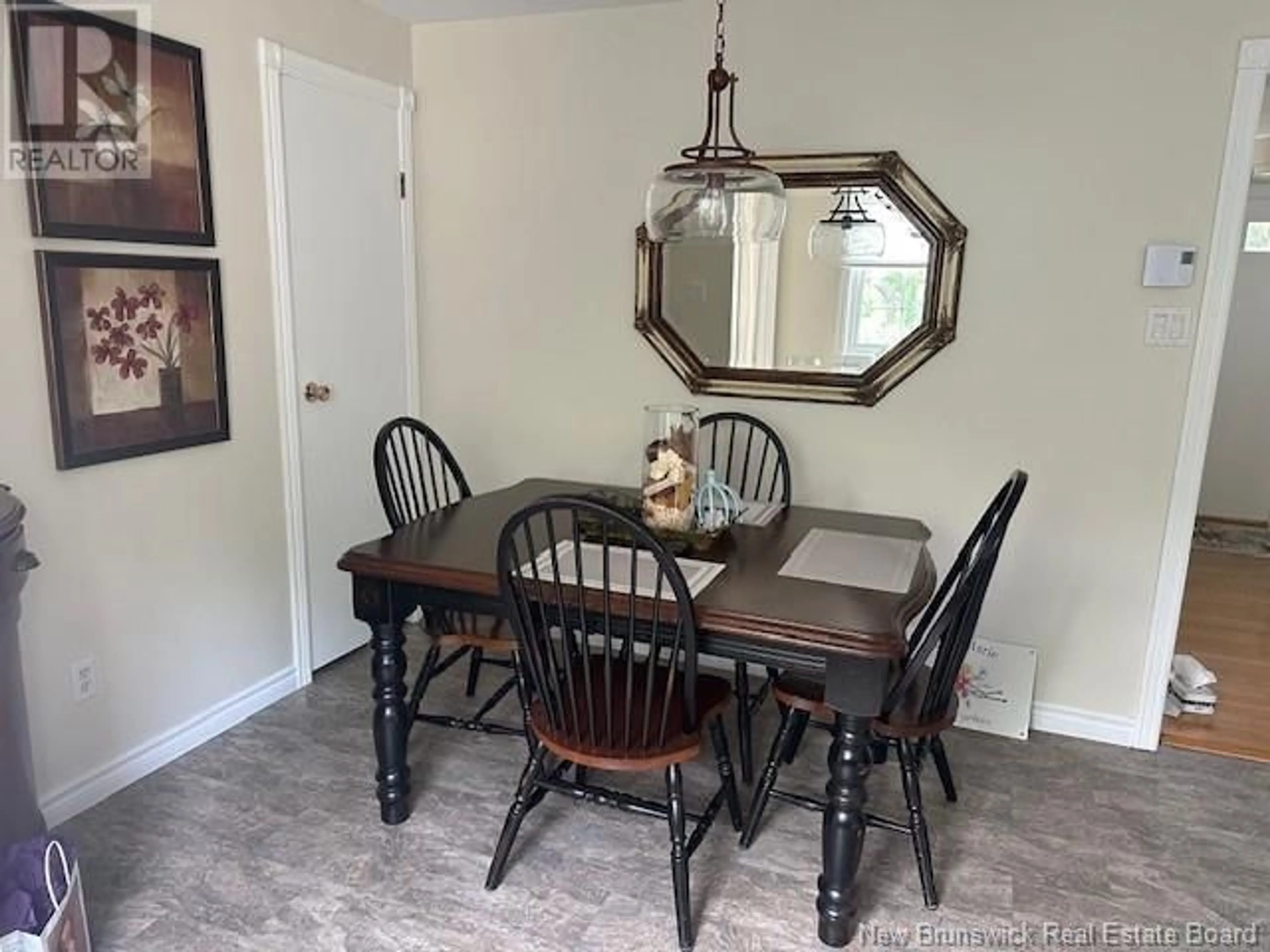 Dining room, wood/laminate floor for 13 VAN HORNE CRESCENT, Campbellton New Brunswick E3N3K5