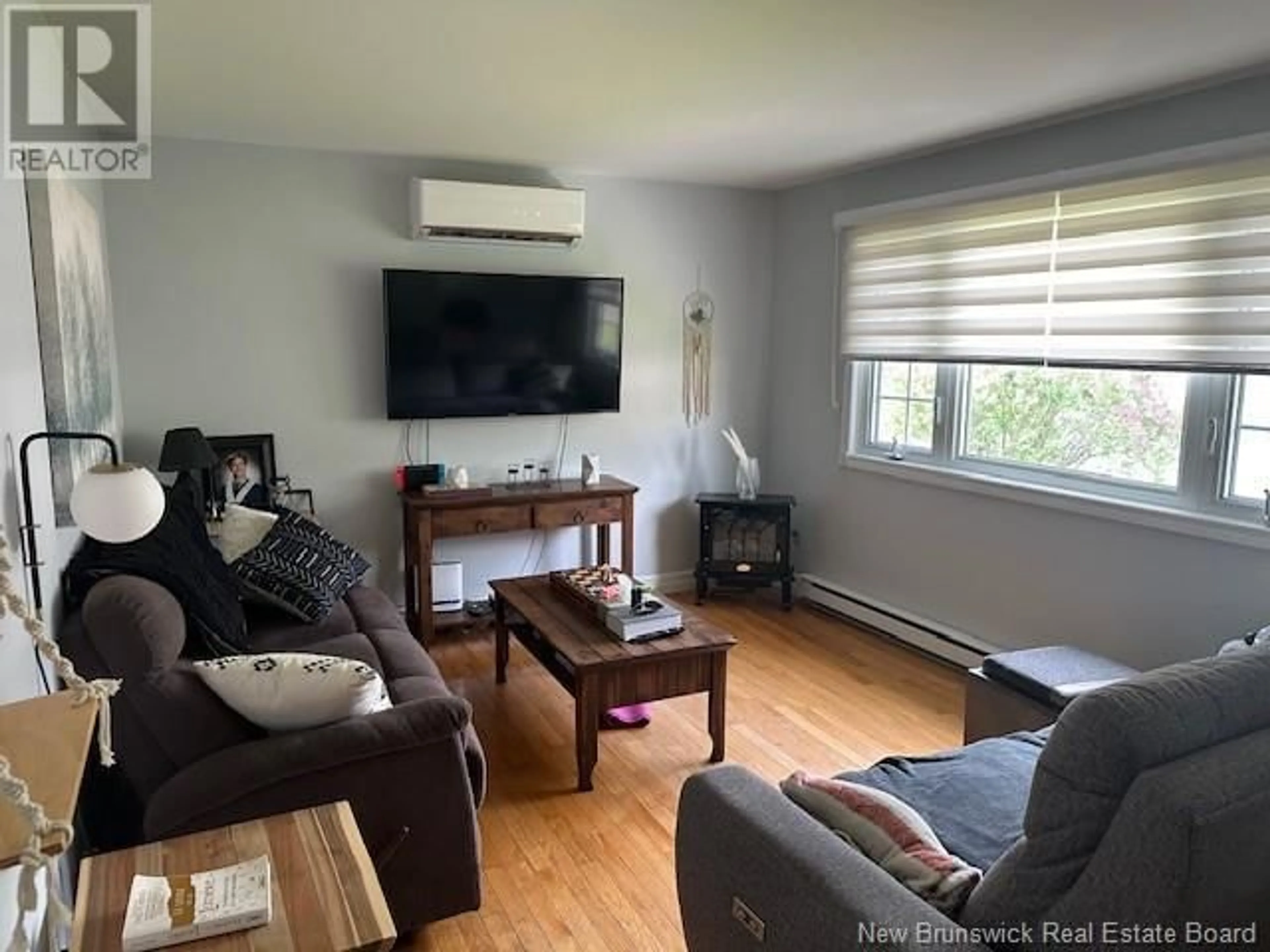 Living room with furniture, unknown for 13 VAN HORNE CRESCENT, Campbellton New Brunswick E3N3K5