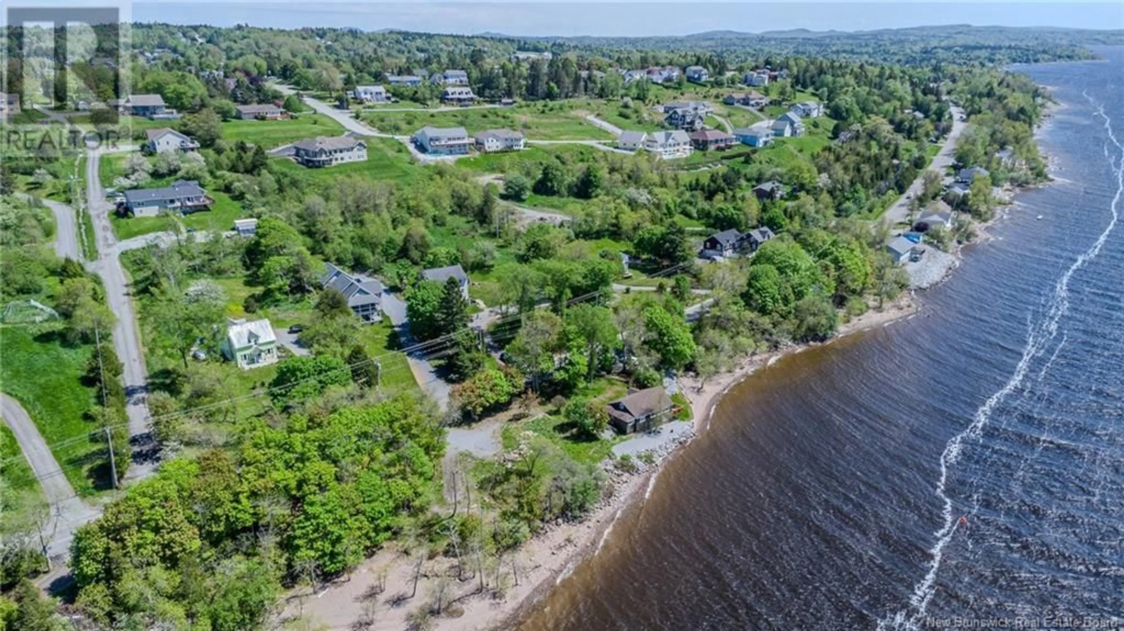 A pic from outside/outdoor area/front of a property/back of a property/a pic from drone, water/lake/river/ocean view for 486 GONDOLA POINT ROAD, Quispamsis New Brunswick E2E1E4