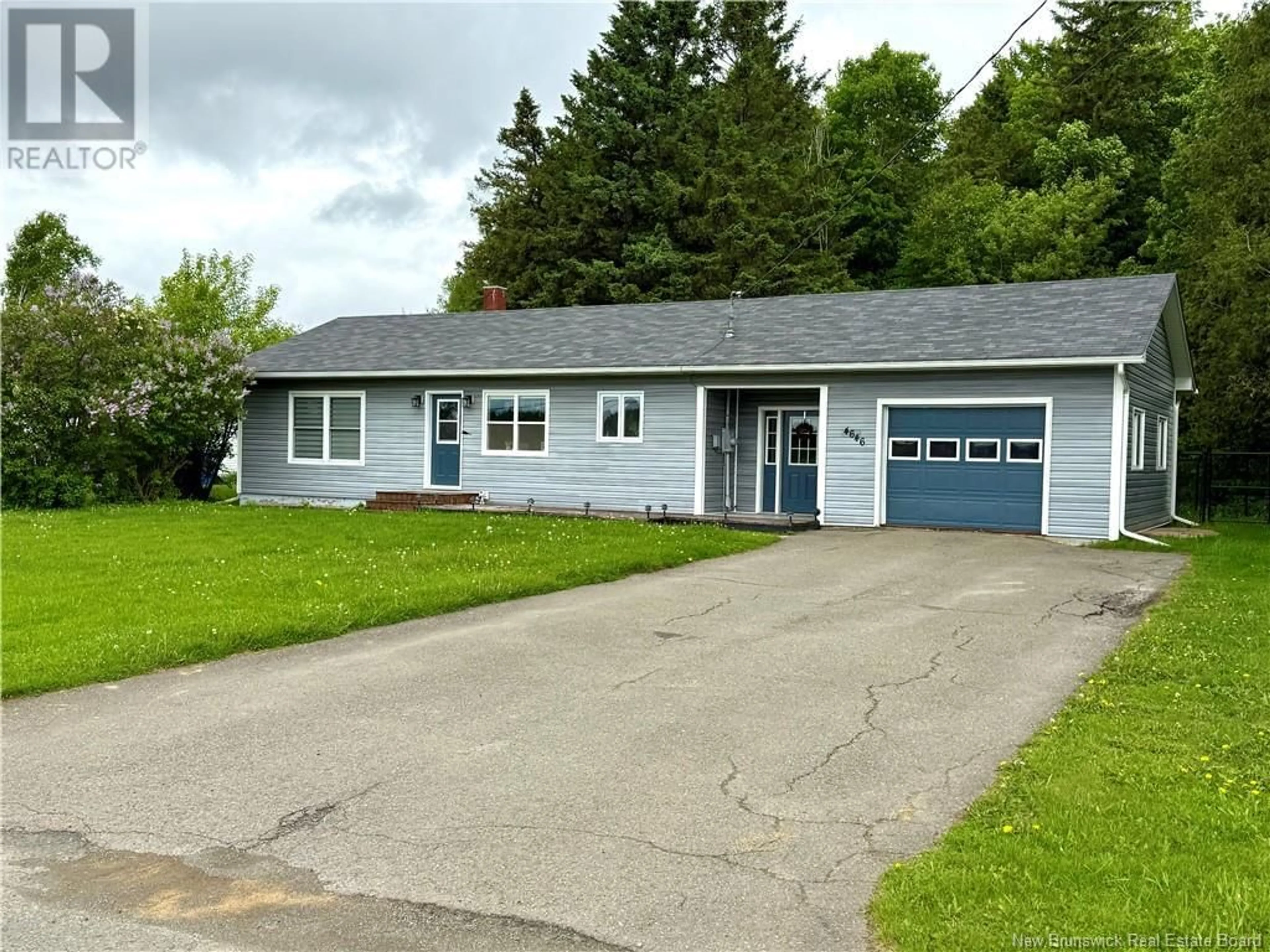 Home with vinyl exterior material, street for 4646 JUNIPER ROAD, Florenceville-Bristol New Brunswick E7L2K1