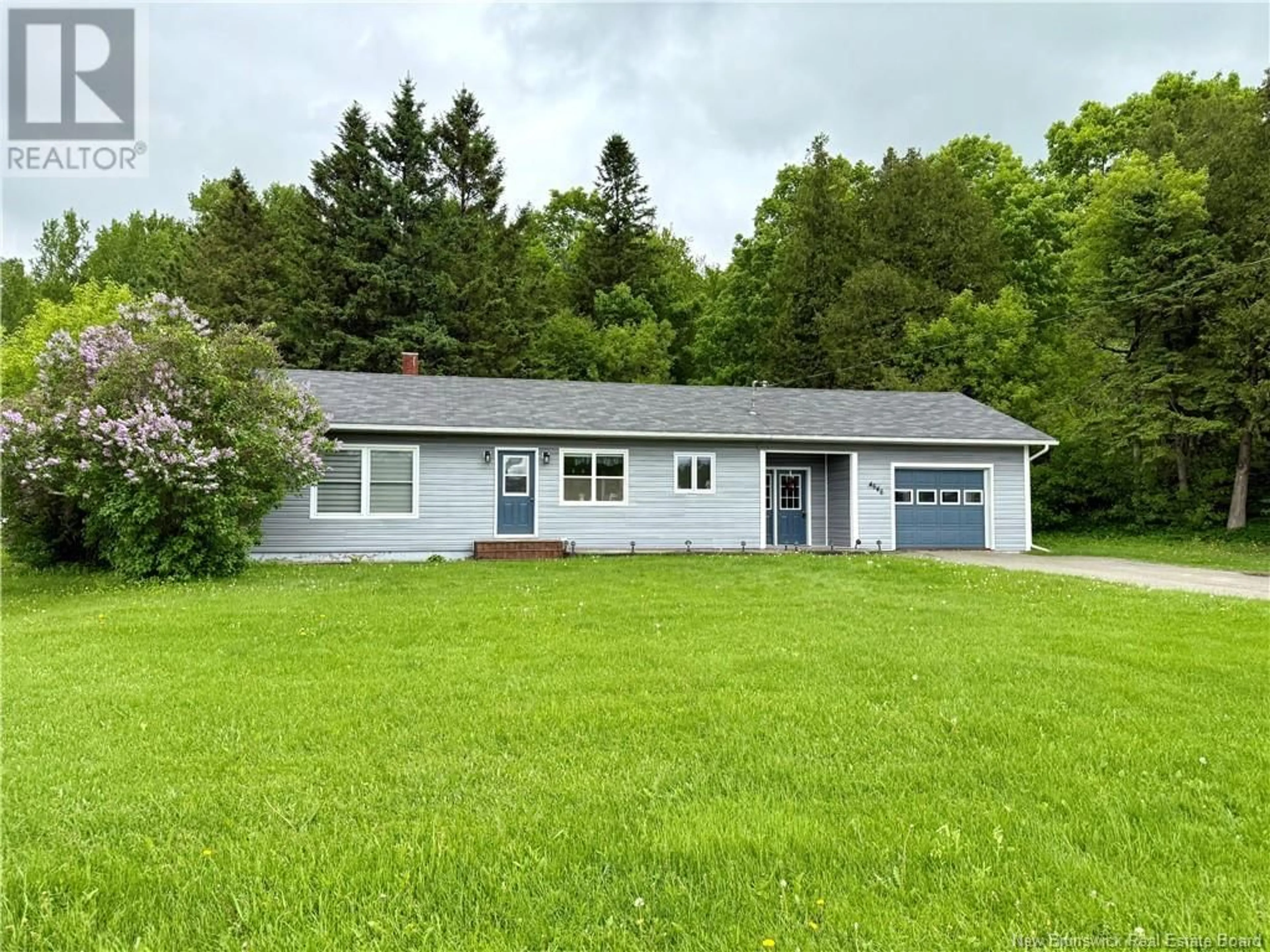 Home with vinyl exterior material, street for 4646 JUNIPER ROAD, Florenceville-Bristol New Brunswick E7L2K1