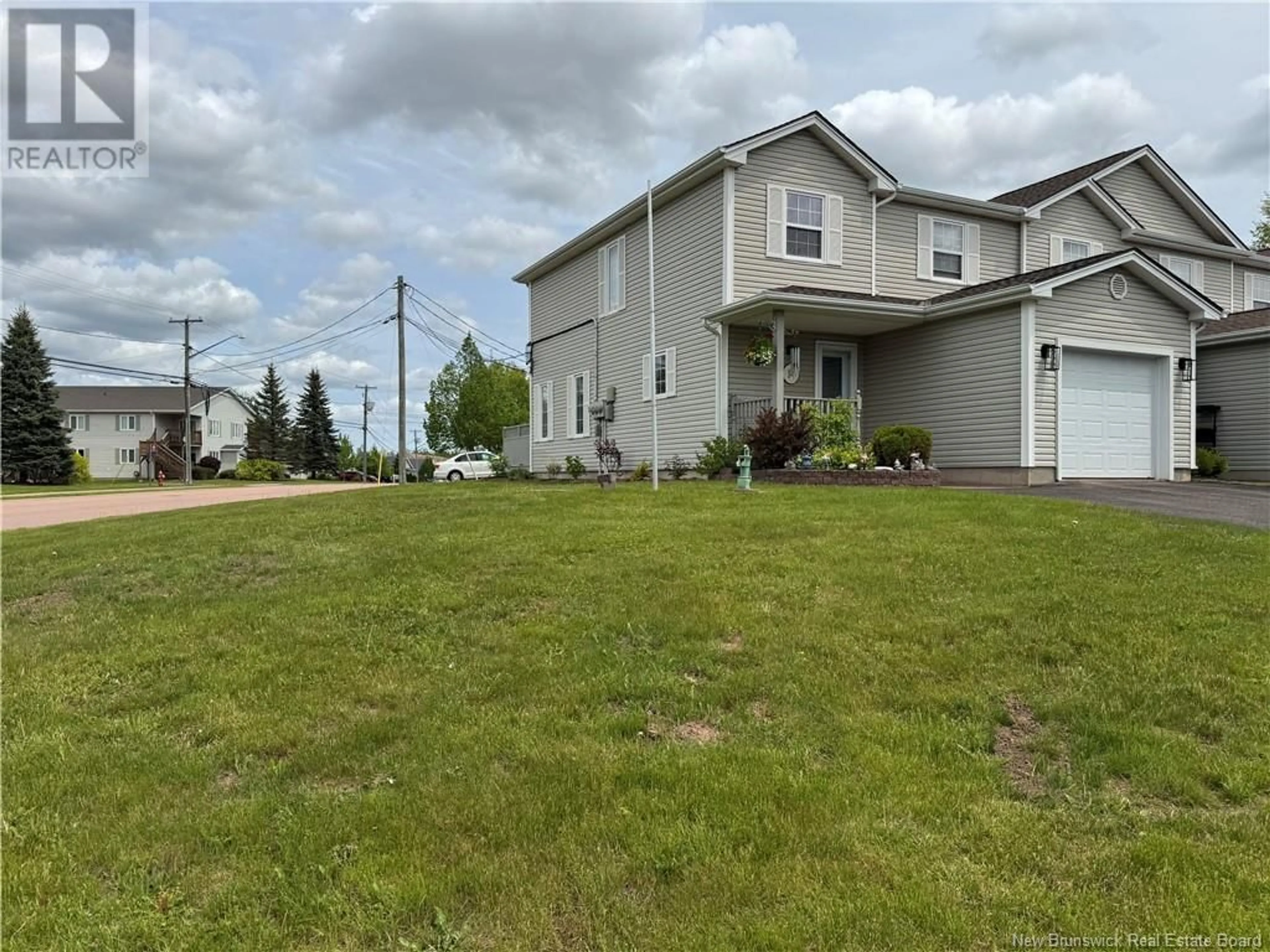 A pic from outside/outdoor area/front of a property/back of a property/a pic from drone, street for 14 FIRMIN CRESCENT, Dieppe New Brunswick E1A7T1