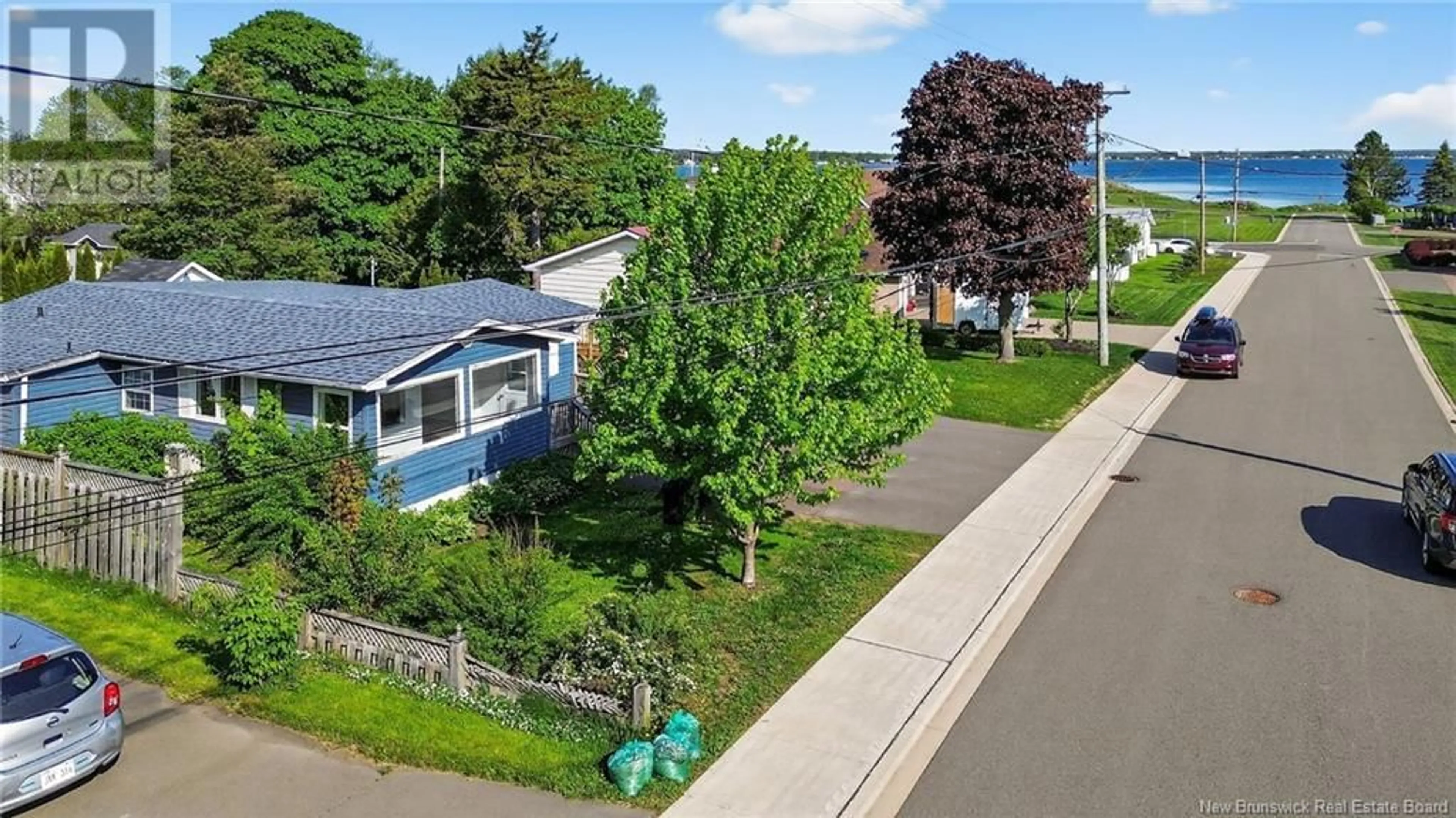 A pic from outside/outdoor area/front of a property/back of a property/a pic from drone, street for 135 BROWN, Shediac New Brunswick E4P1J6