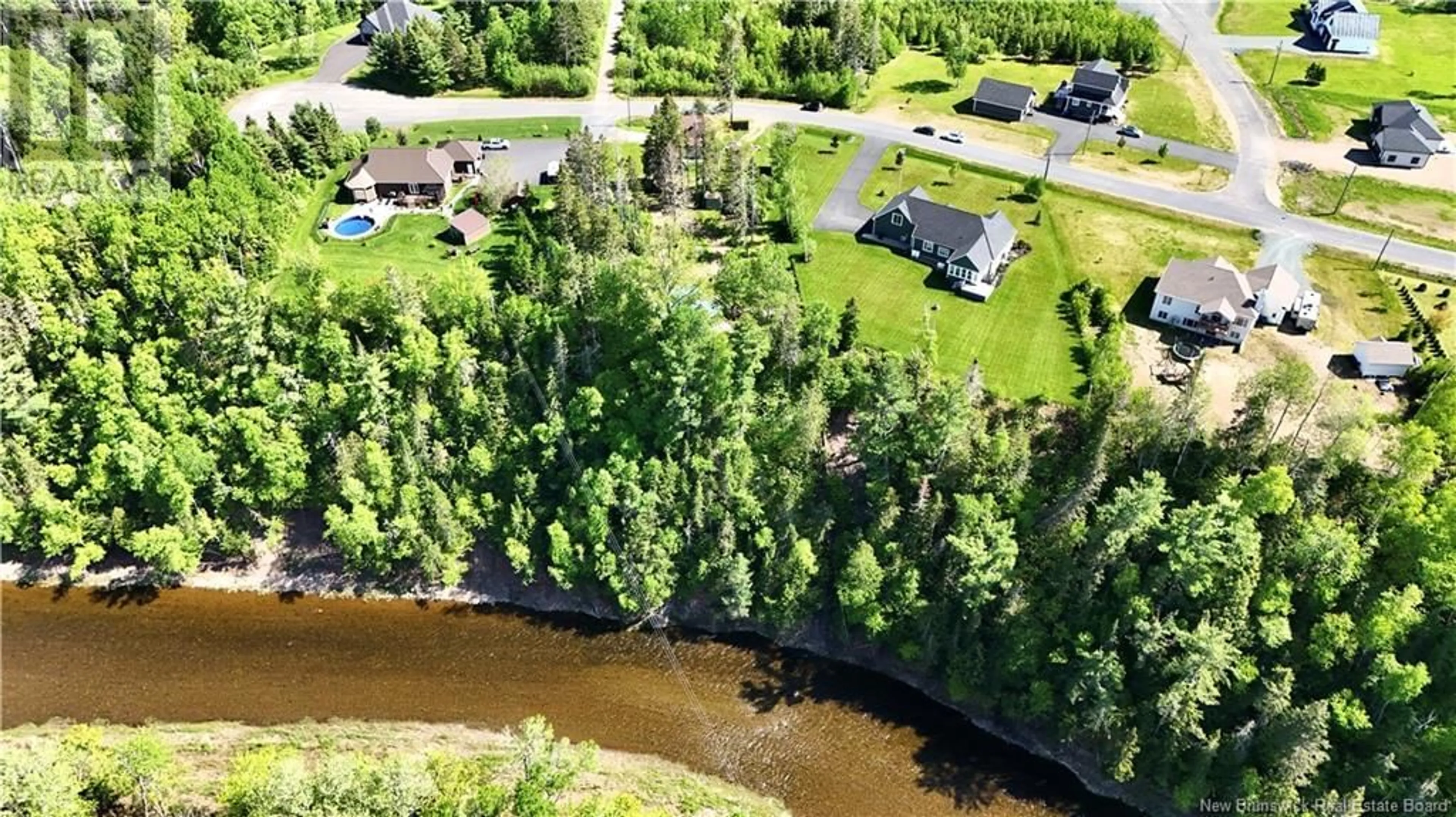 A pic from outside/outdoor area/front of a property/back of a property/a pic from drone, water/lake/river/ocean view for 17 OLSCAMP, South Tetagouche New Brunswick E2A4Z2