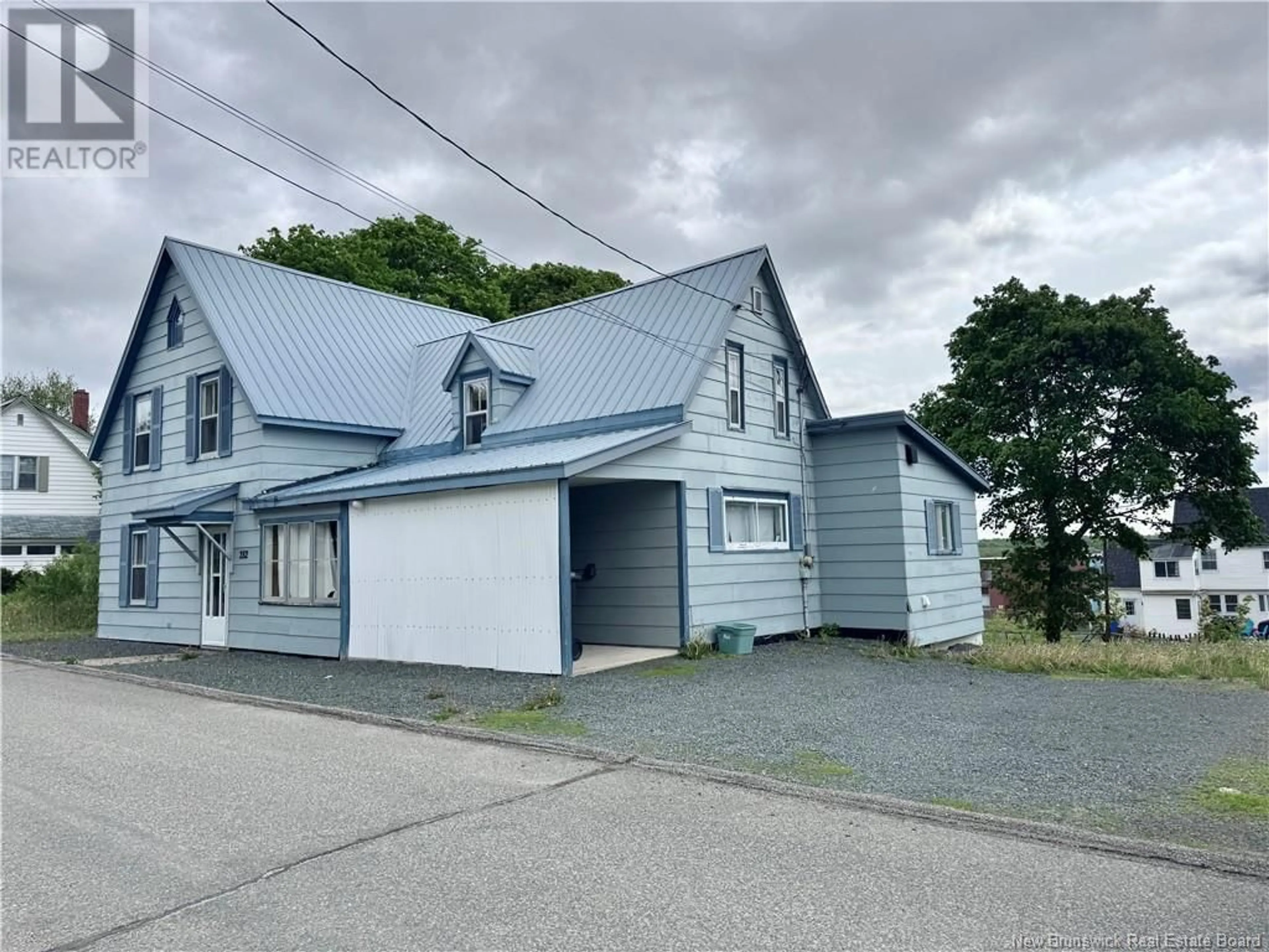 A pic from outside/outdoor area/front of a property/back of a property/a pic from drone, street for 282 MCKENZIE STREET, Miramichi New Brunswick E1V1V4