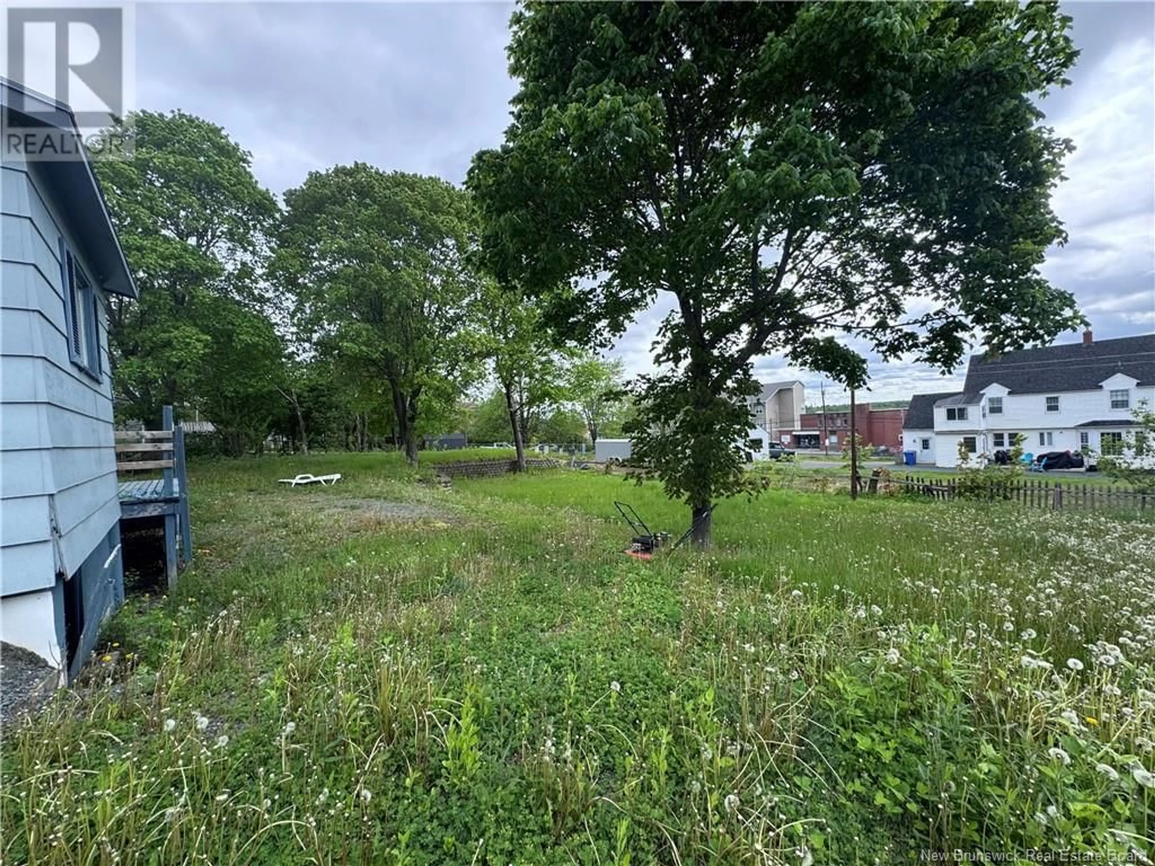 A pic from outside/outdoor area/front of a property/back of a property/a pic from drone, unknown for 282 MCKENZIE STREET, Miramichi New Brunswick E1V1V4