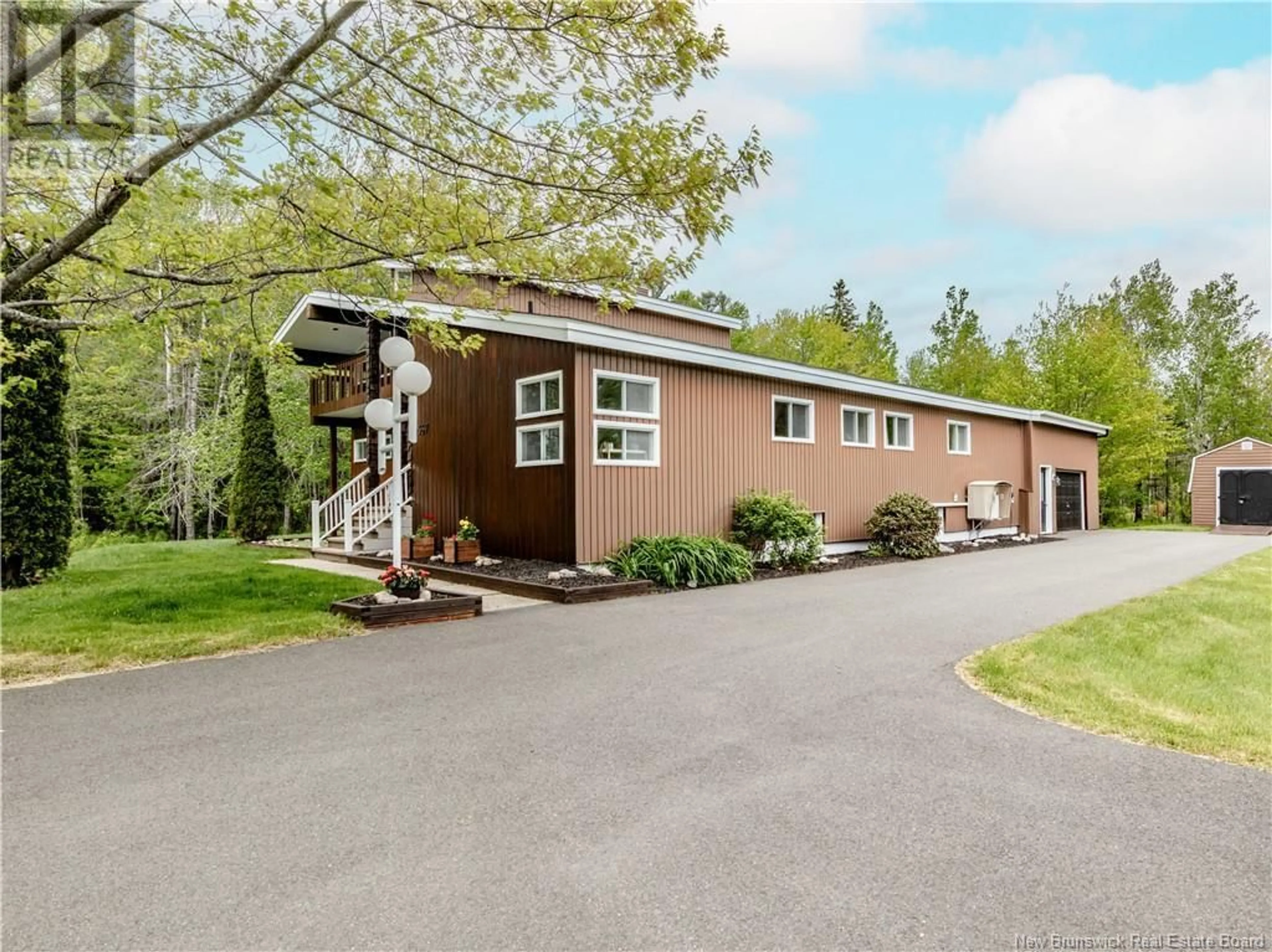 Home with vinyl exterior material, street for 10357 ROUTE 134, Saint-Louis-De-Kent New Brunswick E4X1J5