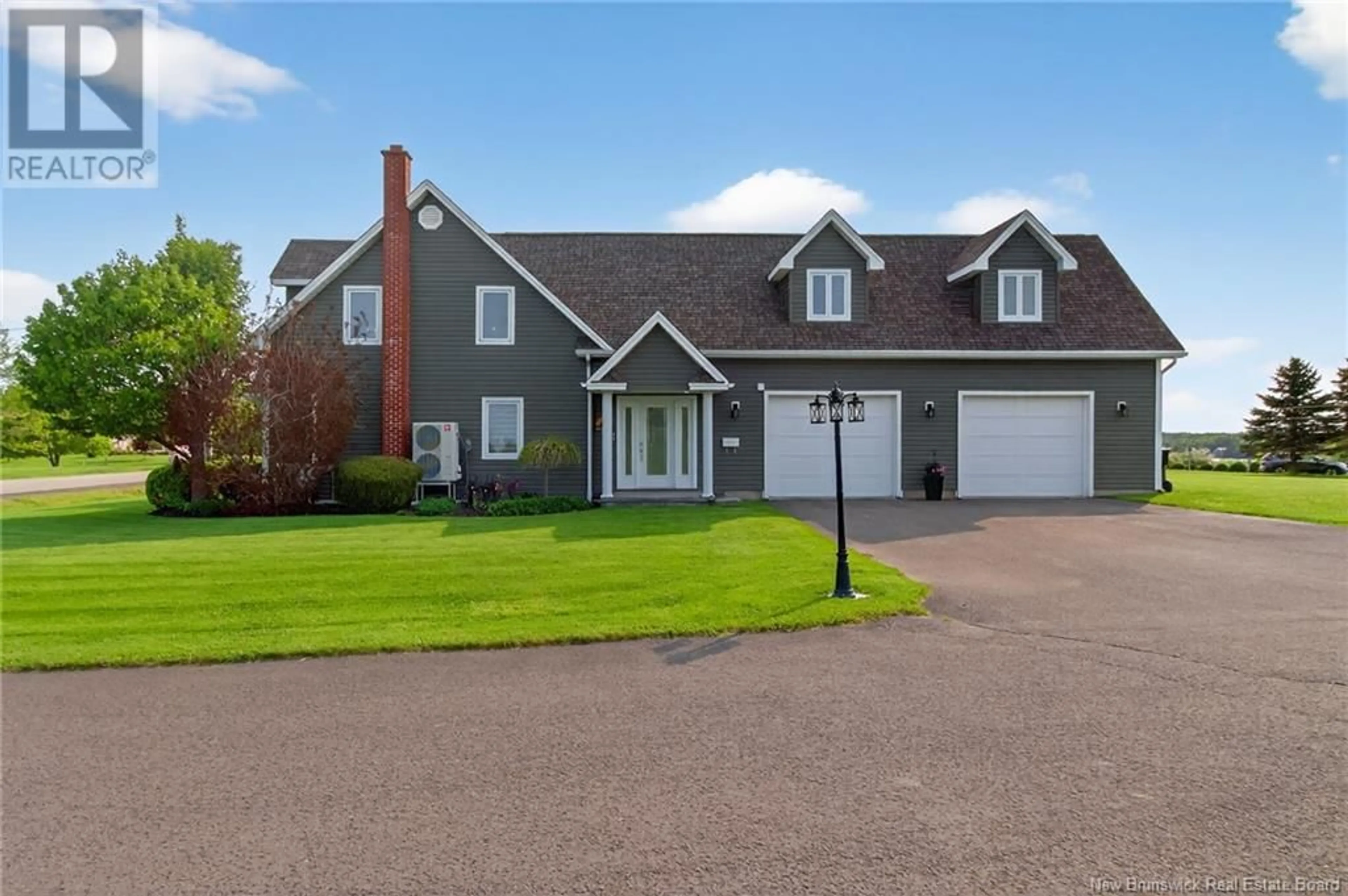 Home with vinyl exterior material, street for 1215 RTE 515, Bouctouche Cove New Brunswick E4S4J4