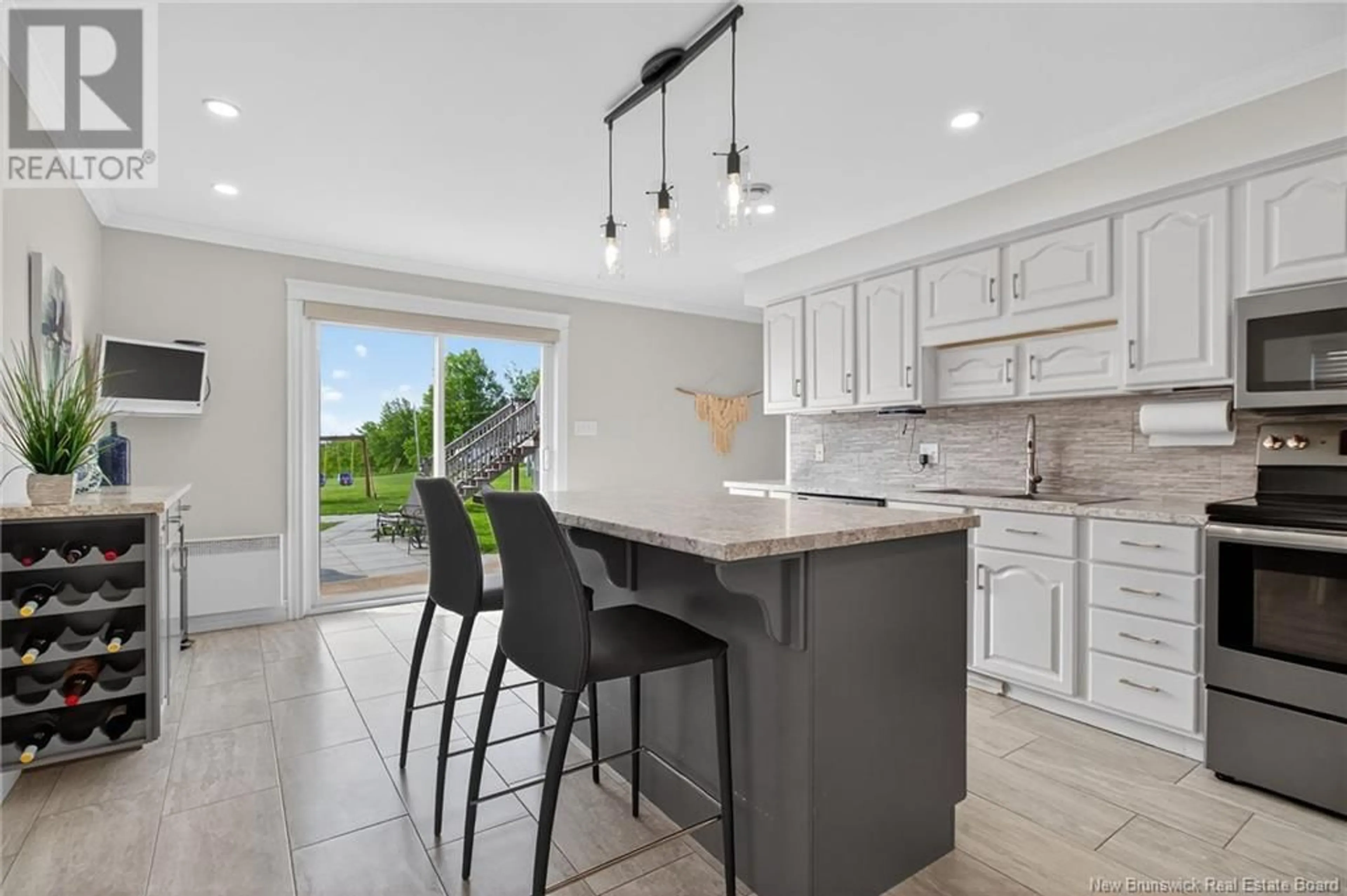 Open concept kitchen, ceramic/tile floor for 1215 RTE 515, Bouctouche Cove New Brunswick E4S4J4