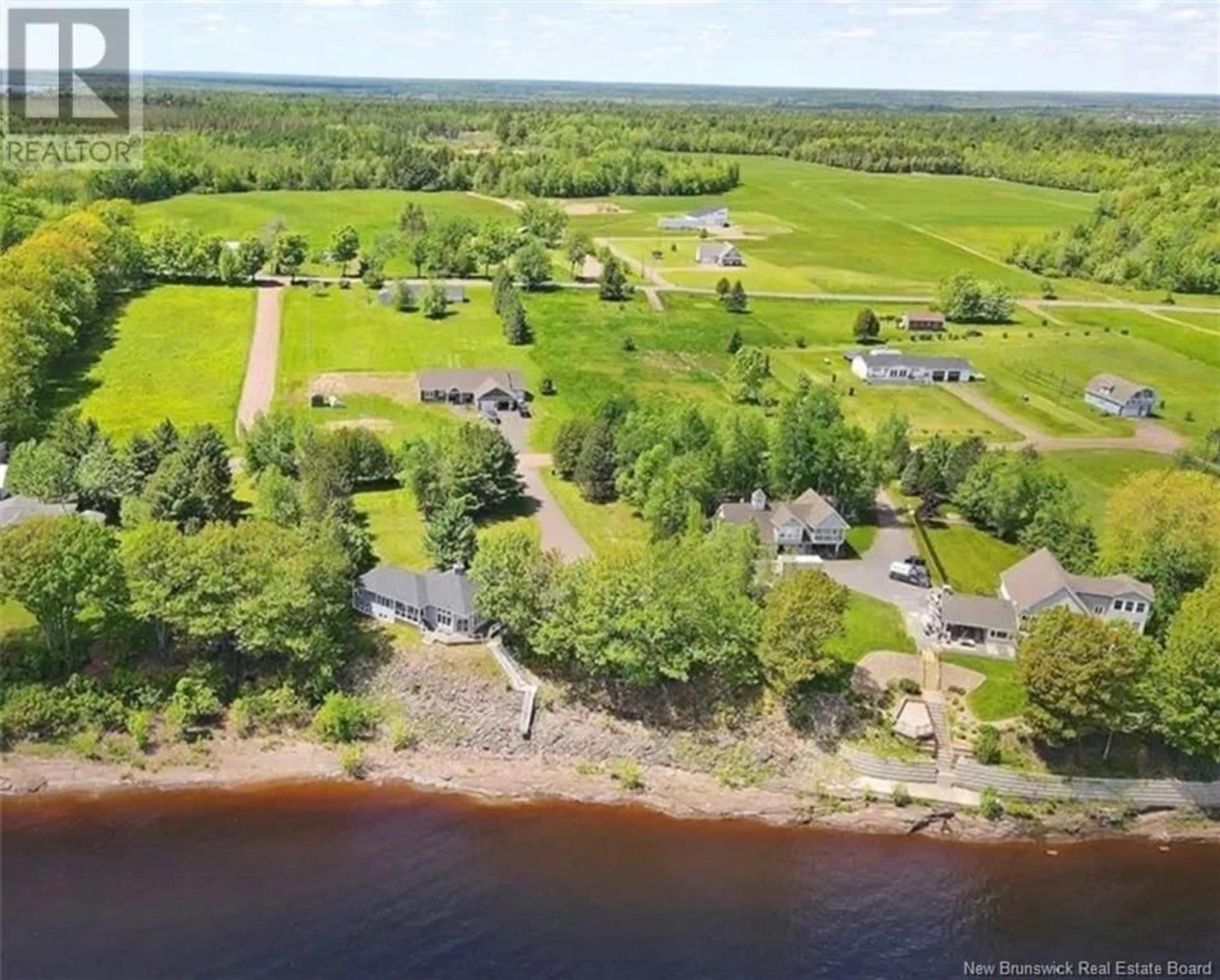 A pic from outside/outdoor area/front of a property/back of a property/a pic from drone, water/lake/river/ocean view for 18 COTTAGE LANE, Grand Lake New Brunswick E4B0B5