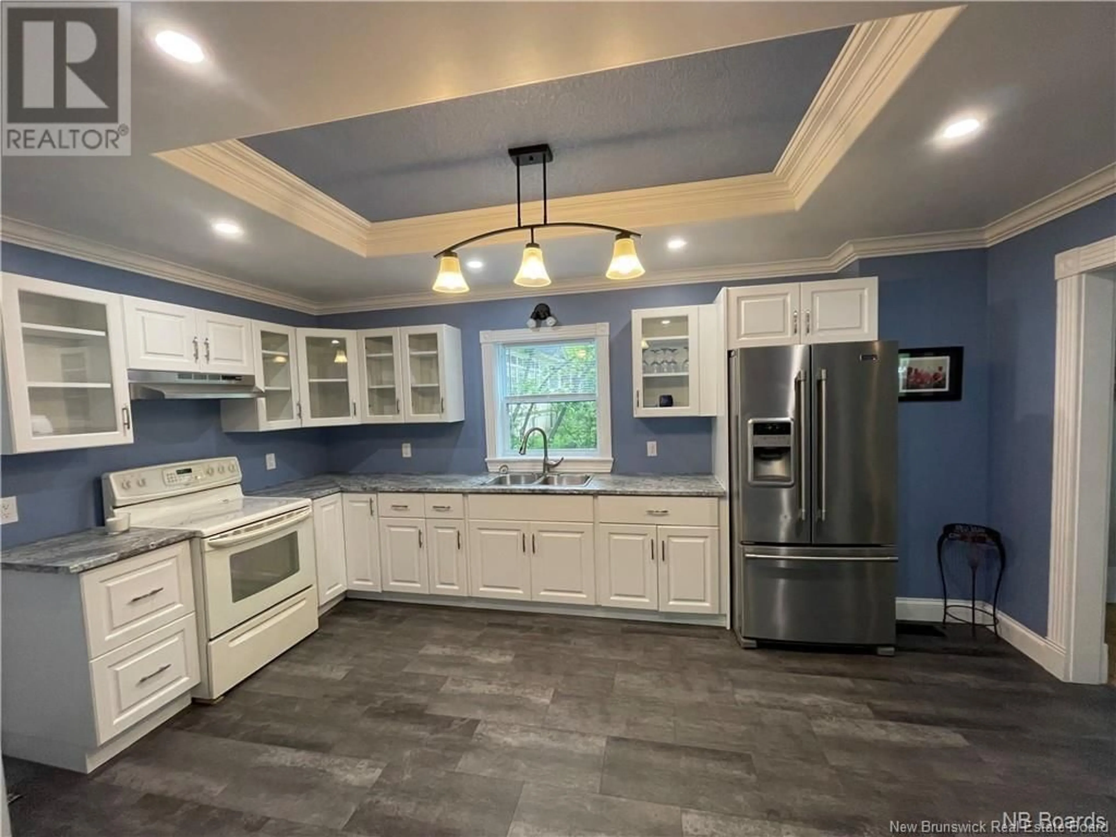 Open concept kitchen, ceramic/tile floor for 519 KING GEORGE WAY, Miramichi New Brunswick E1V1M9