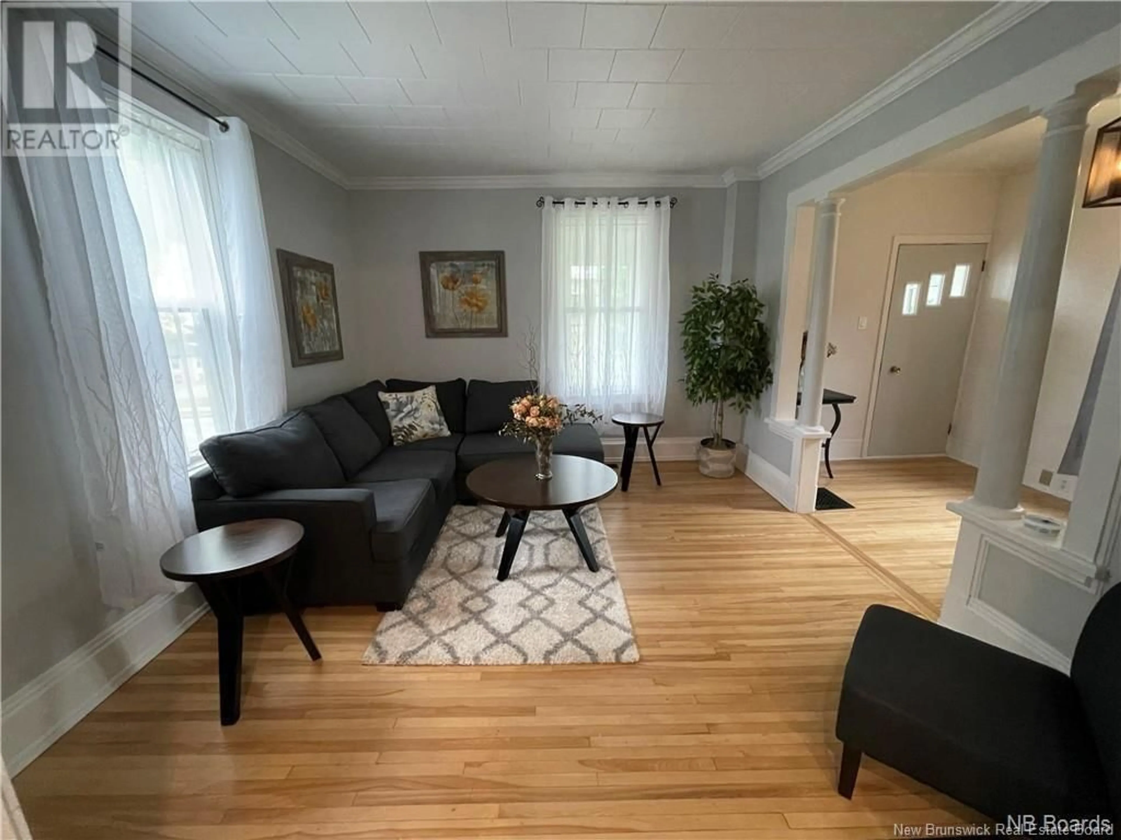 Living room with furniture, wood/laminate floor for 519 KING GEORGE WAY, Miramichi New Brunswick E1V1M9