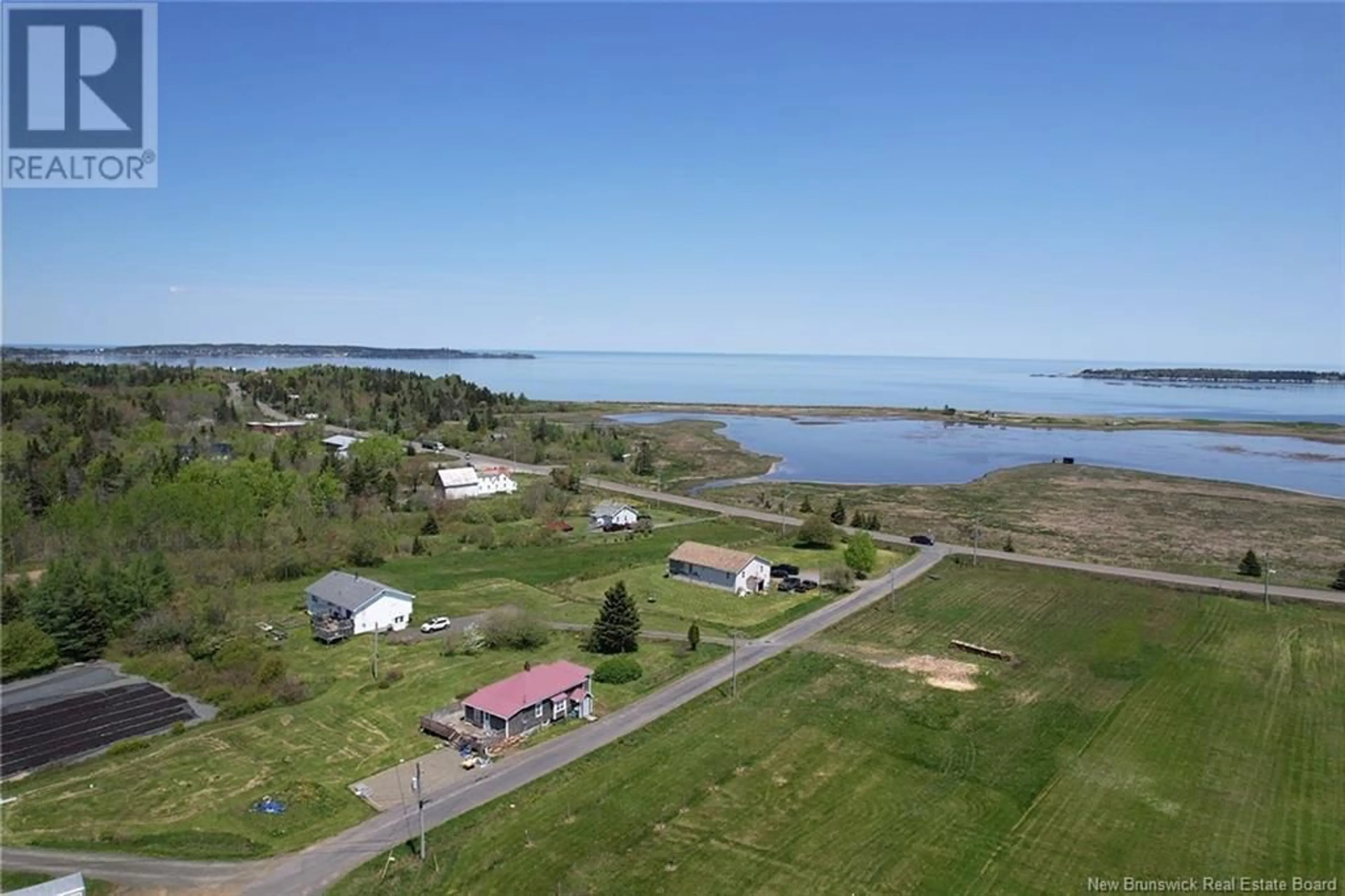 A pic from outside/outdoor area/front of a property/back of a property/a pic from drone, water/lake/river/ocean view for 14 MIDDLETON ROAD, Grand Manan New Brunswick E5G3C8