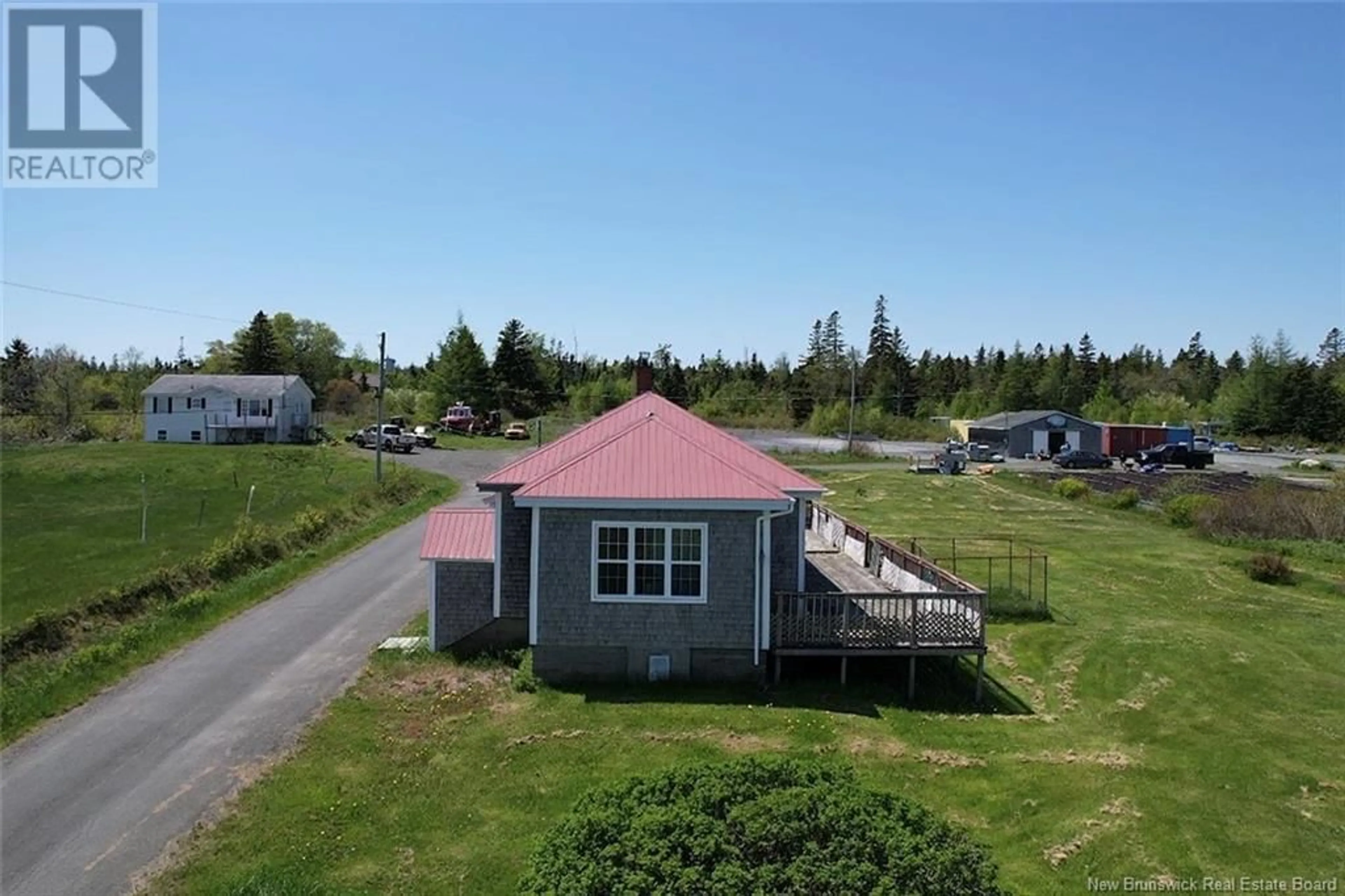 A pic from outside/outdoor area/front of a property/back of a property/a pic from drone, unknown for 14 MIDDLETON ROAD, Grand Manan New Brunswick E5G3C8
