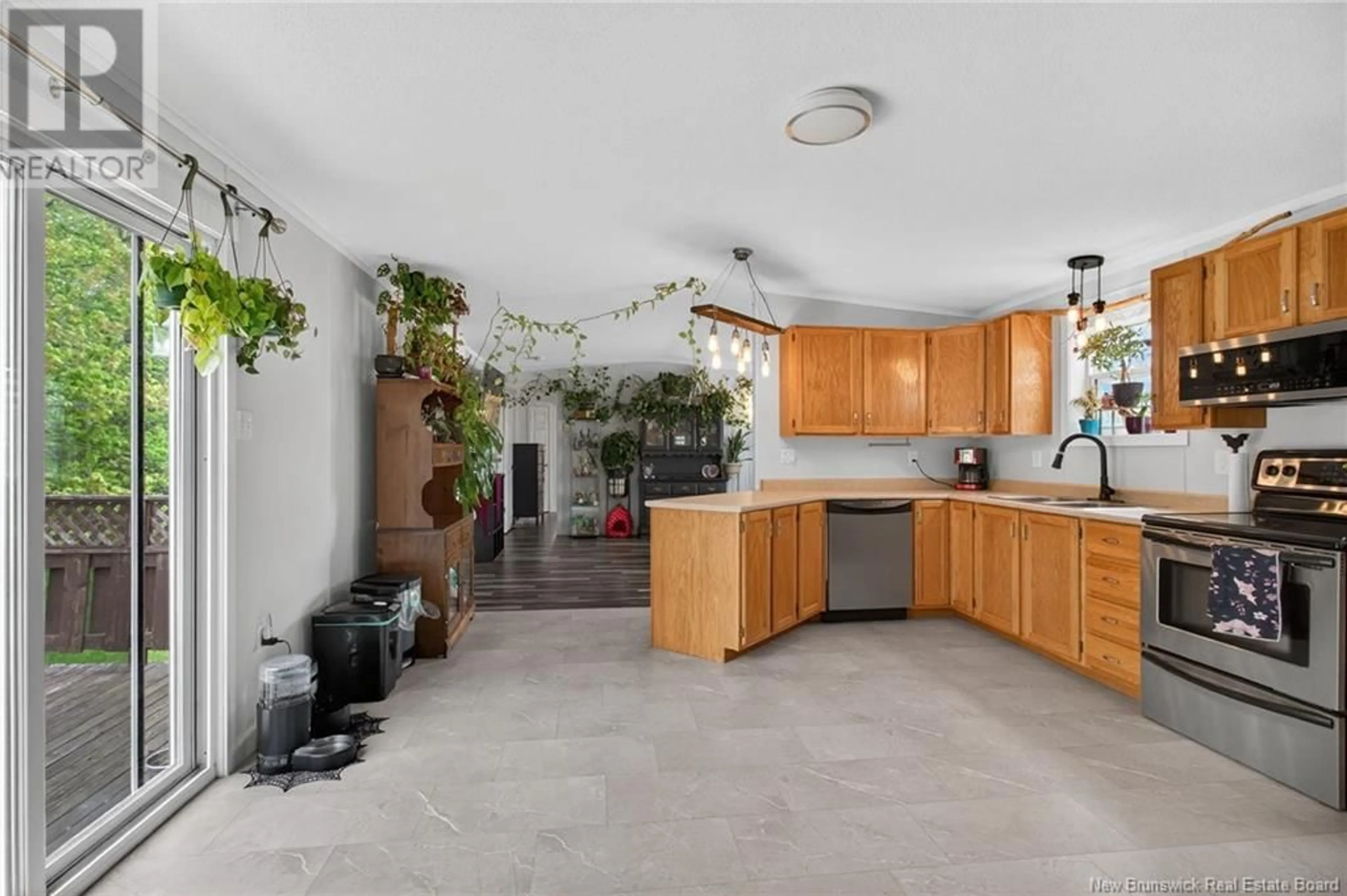 Open concept kitchen, ceramic/tile floor for 160 NEPISIGUIT DRIVE, Dieppe New Brunswick E1A7N1