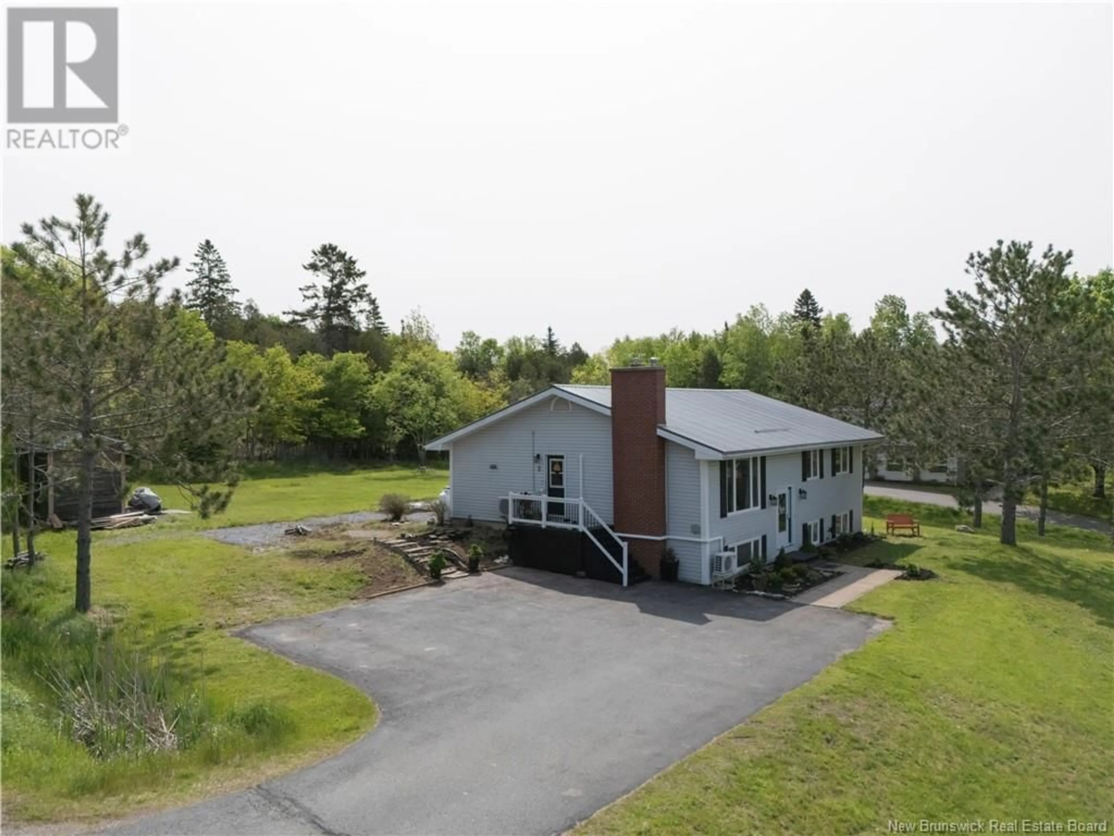 A pic from outside/outdoor area/front of a property/back of a property/a pic from drone, unknown for 2 WILLOWBRIAR DRIVE, Quispamsis New Brunswick E2G1N3