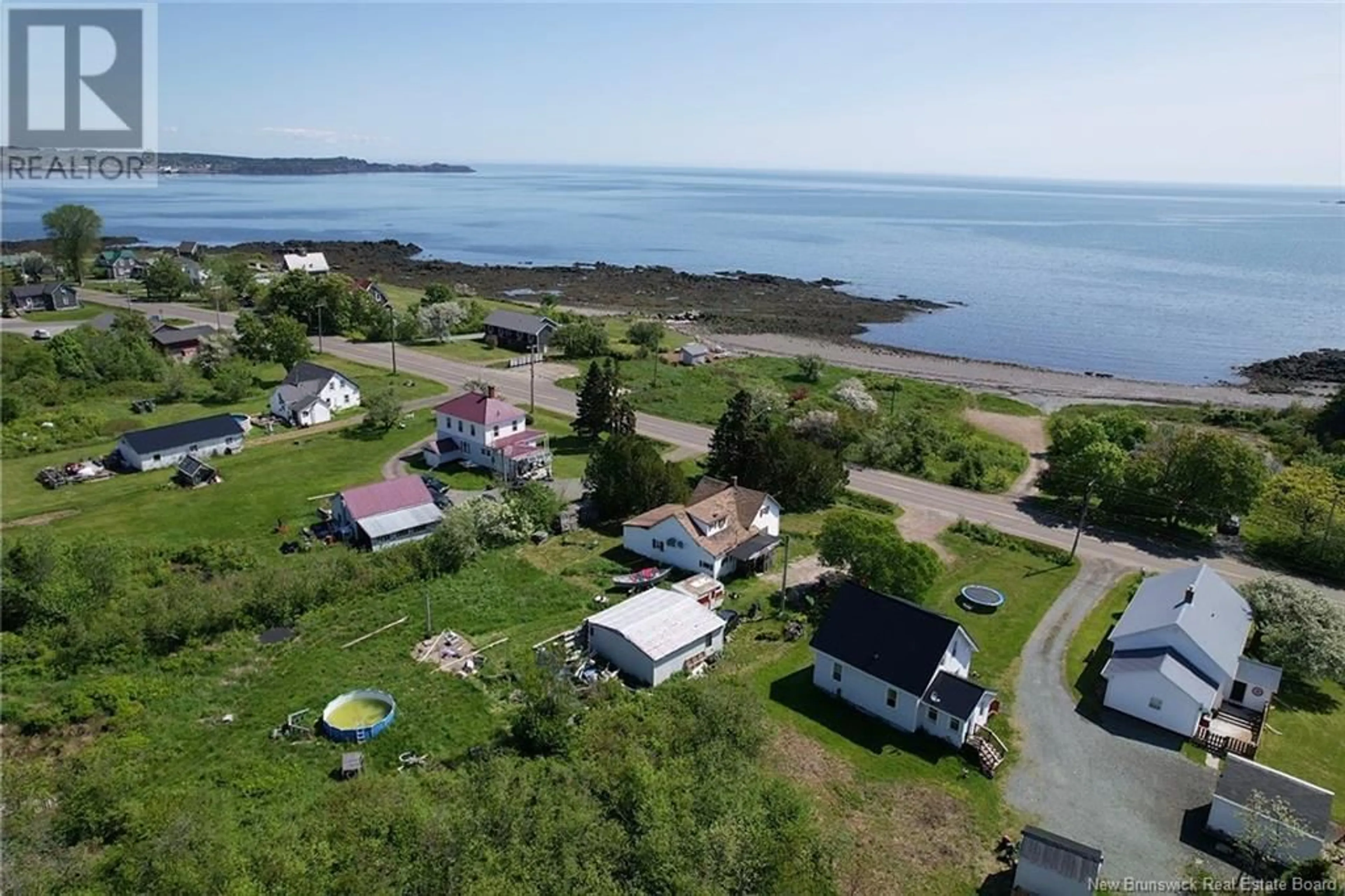 A pic from outside/outdoor area/front of a property/back of a property/a pic from drone, water/lake/river/ocean view for 500 ROUTE 776, Grand Manan New Brunswick E5G4K8